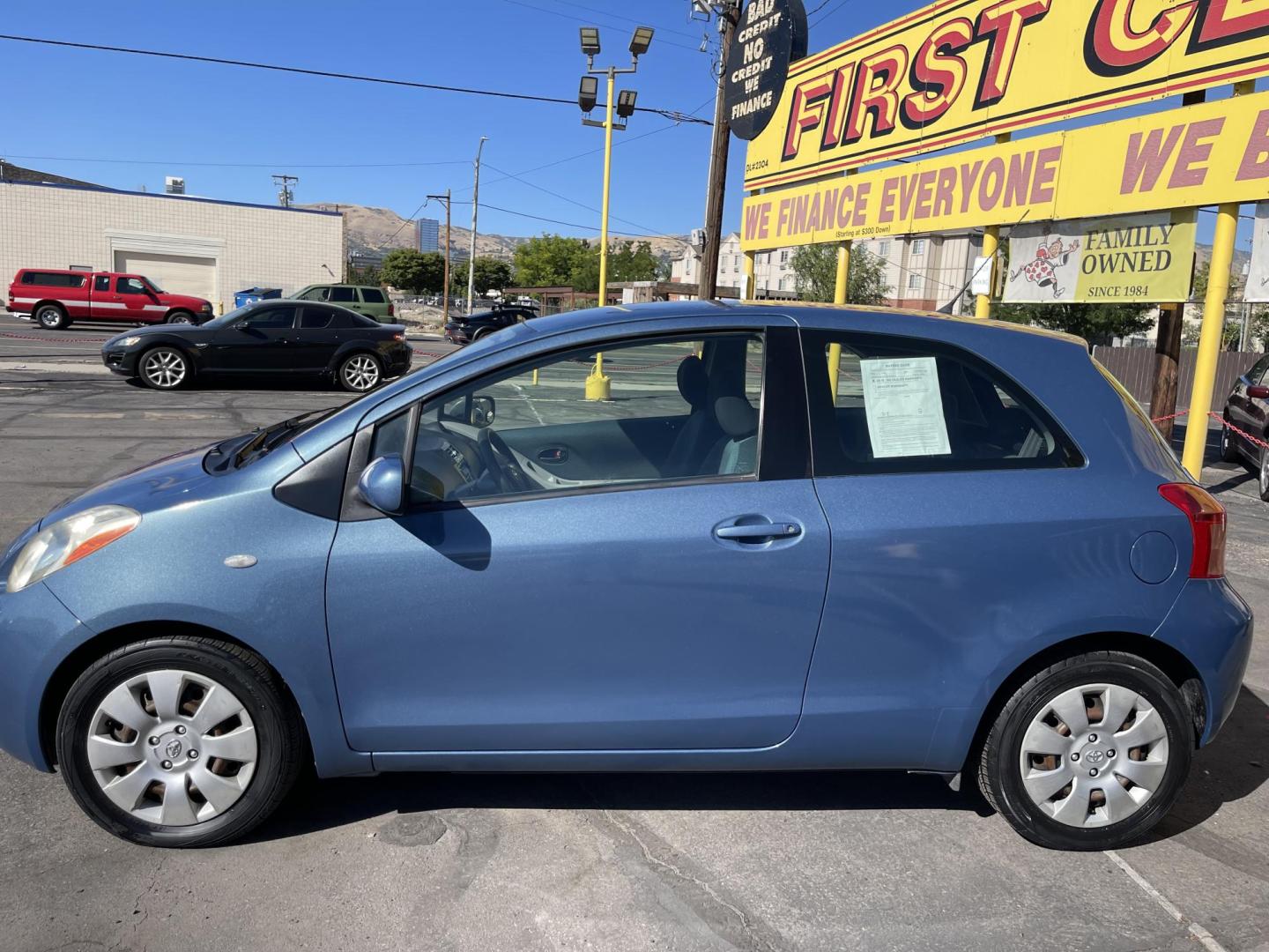 2008 Blue /Tan Toyota Yaris Liftback (JTDJT923785) with an 1.5L L4 DOHC 16V engine, Manual transmission, located at 801 South State Street, Salt Lake City, UT, 84111, (801) 328-0098, 40.751953, -111.888206 - Clean 1 owner! Clean title! Great gas mileage gets over 35-40 MPG with a manual transmission and 1.5 liter 4 cylinder! Perfect commuter car for anyone who drives to work over 20-50 miles! This is a perfect car to travel on long distance trips to save gas money! Features: Cloth Seats, AM/FM Stereo, - Photo#10