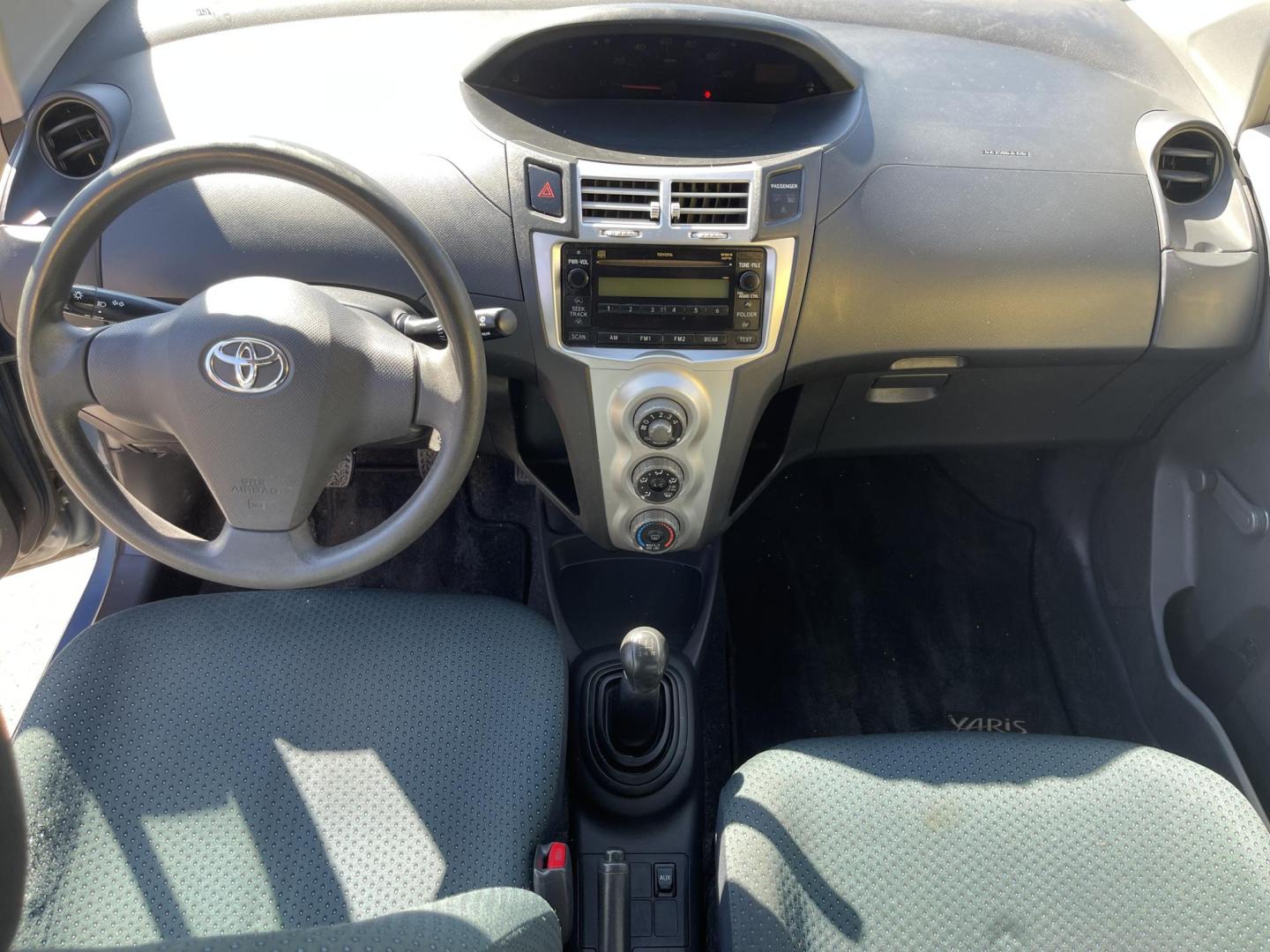 2008 Blue /Tan Toyota Yaris Liftback (JTDJT923785) with an 1.5L L4 DOHC 16V engine, Manual transmission, located at 801 South State Street, Salt Lake City, UT, 84111, (801) 328-0098, 40.751953, -111.888206 - Clean 1 owner! Clean title! Great gas mileage gets over 35-40 MPG with a manual transmission and 1.5 liter 4 cylinder! Perfect commuter car for anyone who drives to work over 20-50 miles! This is a perfect car to travel on long distance trips to save gas money! Features: Cloth Seats, AM/FM Stereo, - Photo#16