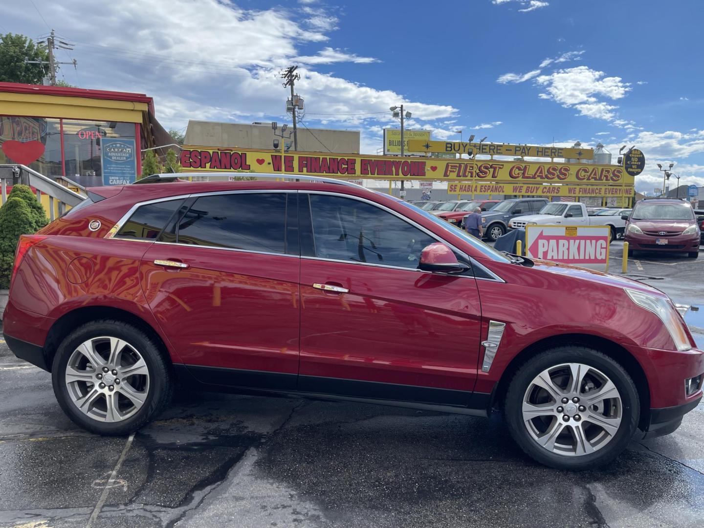 2012 /Tan Cadillac SRX Premium (3GYFNCE3XCS) with an 3.6L V6 DOHC 24V FFV engine, 6-Speed Automatic transmission, located at 801 South State Street, Salt Lake City, UT, 84111, (801) 328-0098, 40.751953, -111.888206 - Wow extra clean beautiful SUV inside and out! Clean Title! This is a must see only 2 owners on the Carfax history report. From dry climate area no salt, no rust and very clean! Features: 20 Inch Plus Wheels, Navigation System, A/C Seat(s), Panoramic Sunroof, Alloy Wheels, Parking Sensors, BOSE Soun - Photo#4