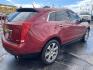 2012 /Tan Cadillac SRX Premium (3GYFNCE3XCS) with an 3.6L V6 DOHC 24V FFV engine, 6-Speed Automatic transmission, located at 801 South State Street, Salt Lake City, UT, 84111, (801) 328-0098, 40.751953, -111.888206 - Wow extra clean beautiful SUV inside and out! Clean Title! This is a must see only 2 owners on the Carfax history report. From dry climate area no salt, no rust and very clean! Features: 20 Inch Plus Wheels, Navigation System, A/C Seat(s), Panoramic Sunroof, Alloy Wheels, Parking Sensors, BOSE Soun - Photo#5