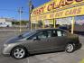 2006 Mineral Gray Metallic /Gray Honda Civic EX Sedan (1HGFA15826L) with an 1.8L L4 SOHC 16V engine, 5-Speed Manual transmission, located at 801 South State Street, Salt Lake City, UT, 84111, (801) 328-0098, 40.751953, -111.888206 - Clean title! Clean Carfax no rebuilt restored, dry climate car hasn't been in the Utah snow yet! Great on gas with a manual transmission 4 cylinder you will get well over 35 MPG!!! Great commuter car to and from work!!! Features: Alloy Wheels, Cloth Seats, Satellite Radio Ready, Sunroof(s), ABS B - Photo#10