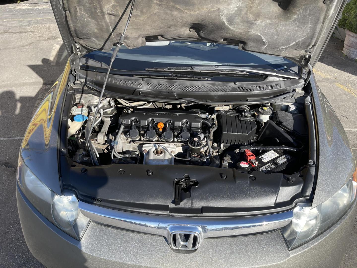 2006 Mineral Gray Metallic /Gray Honda Civic EX Sedan (1HGFA15826L) with an 1.8L L4 SOHC 16V engine, 5-Speed Manual transmission, located at 801 South State Street, Salt Lake City, UT, 84111, (801) 328-0098, 40.751953, -111.888206 - Clean title! Clean Carfax no rebuilt restored, dry climate car hasn't been in the Utah snow yet! Great on gas with a manual transmission 4 cylinder you will get well over 35 MPG!!! Great commuter car to and from work!!! Features: Alloy Wheels, Cloth Seats, Satellite Radio Ready, Sunroof(s), ABS B - Photo#26