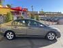 2006 Mineral Gray Metallic /Gray Honda Civic EX Sedan (1HGFA15826L) with an 1.8L L4 SOHC 16V engine, 5-Speed Manual transmission, located at 801 South State Street, Salt Lake City, UT, 84111, (801) 328-0098, 40.751953, -111.888206 - Clean title! Clean Carfax no rebuilt restored, dry climate car hasn't been in the Utah snow yet! Great on gas with a manual transmission 4 cylinder you will get well over 35 MPG!!! Great commuter car to and from work!!! Features: Alloy Wheels, Cloth Seats, Satellite Radio Ready, Sunroof(s), ABS B - Photo#4