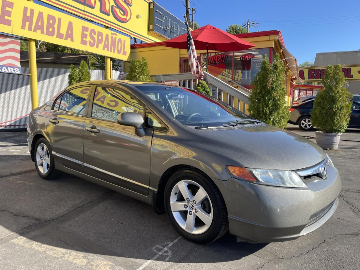 2006 Mineral Gray Metallic /Gray Honda Civic EX Sedan (1HGFA15826L) with an 1.8L L4 SOHC 16V engine, 5-Speed Manual transmission, located at 801 South State Street, Salt Lake City, UT, 84111, (801) 328-0098, 40.751953, -111.888206 - Clean title! Clean Carfax no rebuilt restored, dry climate car hasn't been in the Utah snow yet! Great on gas with a manual transmission 4 cylinder you will get well over 35 MPG!!! Great commuter car to and from work!!! Features: Alloy Wheels, Cloth Seats, Satellite Radio Ready, Sunroof(s), ABS B - Photo#5