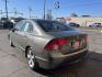 2006 Mineral Gray Metallic /Gray Honda Civic EX Sedan (1HGFA15826L) with an 1.8L L4 SOHC 16V engine, 5-Speed Manual transmission, located at 801 South State Street, Salt Lake City, UT, 84111, (801) 328-0098, 40.751953, -111.888206 - Clean title! Clean Carfax no rebuilt restored, dry climate car hasn't been in the Utah snow yet! Great on gas with a manual transmission 4 cylinder you will get well over 35 MPG!!! Great commuter car to and from work!!! Features: Alloy Wheels, Cloth Seats, Satellite Radio Ready, Sunroof(s), ABS B - Photo#9