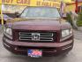 2008 Boston Red Pearl /Brown Honda Ridgeline RTL (2HJYK16508H) with an 3.5L V6 SOHC 24V engine, 5-Speed Automatic Overdrive transmission, located at 801 South State Street, Salt Lake City, UT, 84111, (801) 328-0098, 40.751953, -111.888206 - Super clean! Clean title! Clean Carfax history report no reported accidents on Carfax only 2 reported owners, lots of service records on Carfax vehicle has been well maintained and taken care of they did regular service oil changes etc. We have the Carfax free to look at when you come into our deale - Photo#1