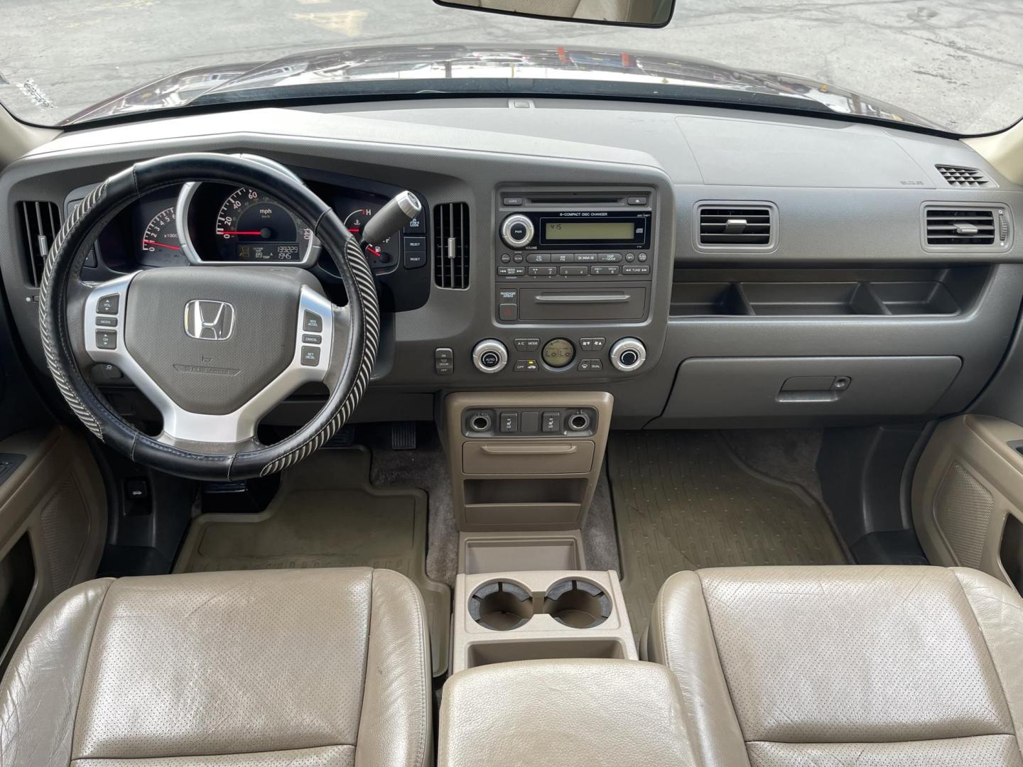 2008 Boston Red Pearl /Brown Honda Ridgeline RTL (2HJYK16508H) with an 3.5L V6 SOHC 24V engine, 5-Speed Automatic Overdrive transmission, located at 801 South State Street, Salt Lake City, UT, 84111, (801) 328-0098, 40.751953, -111.888206 - Super clean! Clean title! Clean Carfax history report no reported accidents on Carfax only 2 reported owners, lots of service records on Carfax vehicle has been well maintained and taken care of they did regular service oil changes etc. We have the Carfax free to look at when you come into our deale - Photo#16