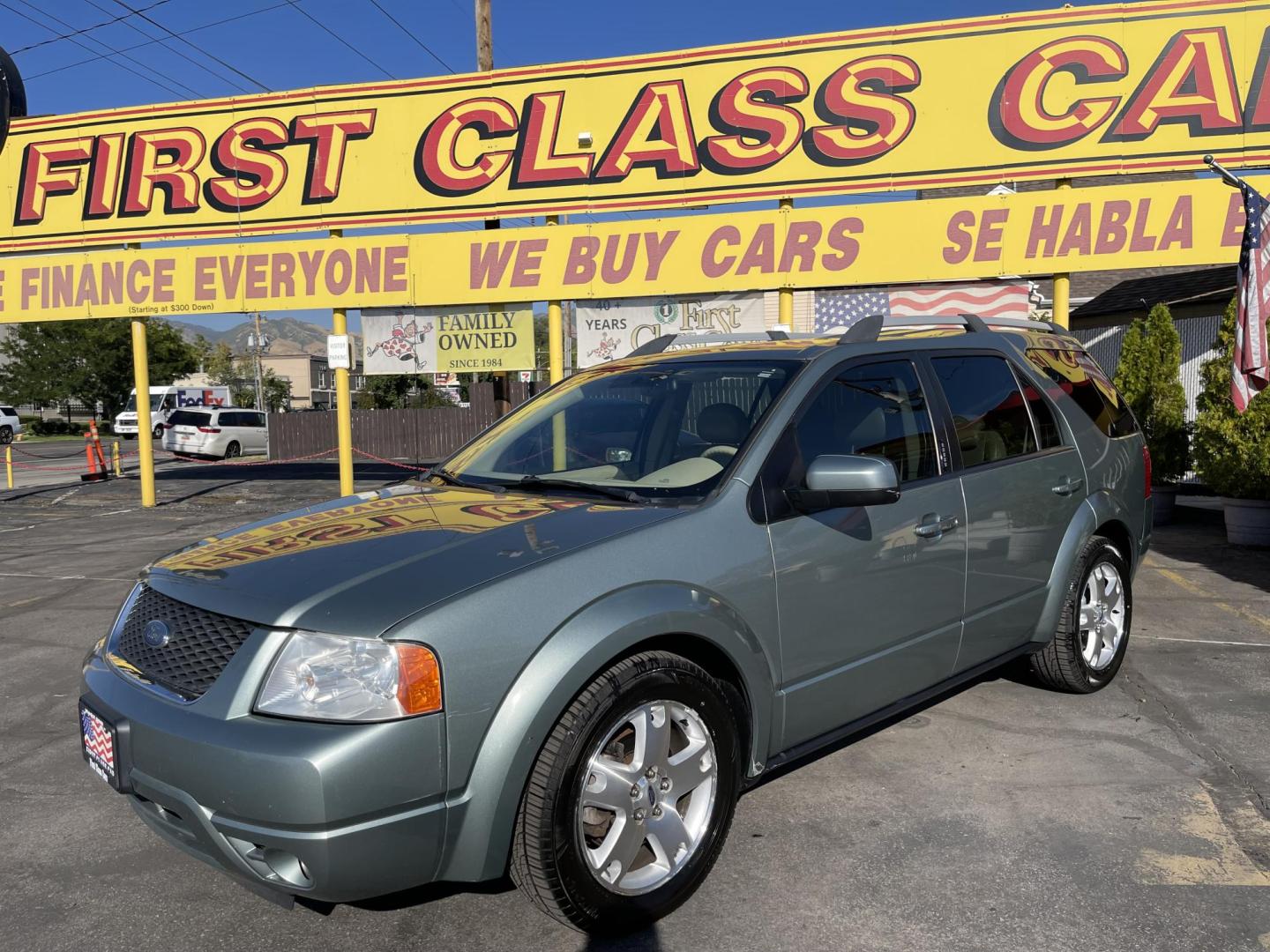 2005 Evergreen Frost Metallic /Tan Ford Freestyle Limited AWD (1FMDK06105G) with an 3.0L V6 DOHC 24V engine, Automatic CVT Overdrive transmission, located at 801 South State Street, Salt Lake City, UT, 84111, (801) 328-0098, 40.751953, -111.888206 - Clean title no reported accidents on Carfax history report. Very nice in great condition for the year and miles. It is in great shape inside and out! Features: 4WD/AWD, Memory Seat(s), Alloy Wheels, Parking Sensors, Fold-Away Third Row, Sunroof(s), Front Seat Heaters,Third Row Seat, Leather Seats, - Photo#2