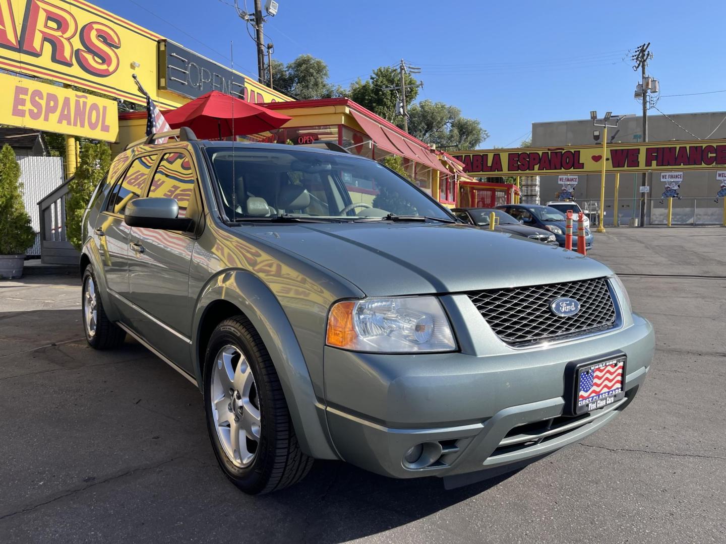 2005 Evergreen Frost Metallic /Tan Ford Freestyle Limited AWD (1FMDK06105G) with an 3.0L V6 DOHC 24V engine, Automatic CVT Overdrive transmission, located at 801 South State Street, Salt Lake City, UT, 84111, (801) 328-0098, 40.751953, -111.888206 - Clean title no reported accidents on Carfax history report. Very nice in great condition for the year and miles. It is in great shape inside and out! Features: 4WD/AWD, Memory Seat(s), Alloy Wheels, Parking Sensors, Fold-Away Third Row, Sunroof(s), Front Seat Heaters,Third Row Seat, Leather Seats, - Photo#4