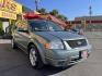 2005 Evergreen Frost Metallic /Tan Ford Freestyle Limited AWD (1FMDK06105G) with an 3.0L V6 DOHC 24V engine, Automatic CVT Overdrive transmission, located at 801 South State Street, Salt Lake City, UT, 84111, (801) 328-0098, 40.751953, -111.888206 - Clean title no reported accidents on Carfax history report. Very nice in great condition for the year and miles. It is in great shape inside and out! Features: 4WD/AWD, Memory Seat(s), Alloy Wheels, Parking Sensors, Fold-Away Third Row, Sunroof(s), Front Seat Heaters,Third Row Seat, Leather Seats, - Photo#4