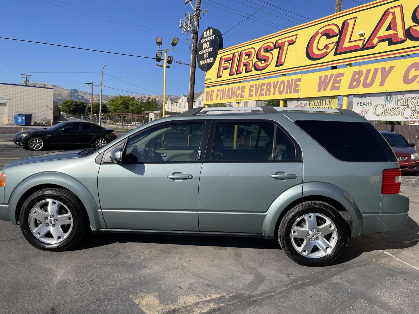 2005 Evergreen Frost Metallic /Tan Ford Freestyle Limited AWD (1FMDK06105G) with an 3.0L V6 DOHC 24V engine, Automatic CVT Overdrive transmission, located at 801 South State Street, Salt Lake City, UT, 84111, (801) 328-0098, 40.751953, -111.888206 - Clean title no reported accidents on Carfax history report. Very nice in great condition for the year and miles. It is in great shape inside and out! Features: 4WD/AWD, Memory Seat(s), Alloy Wheels, Parking Sensors, Fold-Away Third Row, Sunroof(s), Front Seat Heaters,Third Row Seat, Leather Seats, - Photo#9