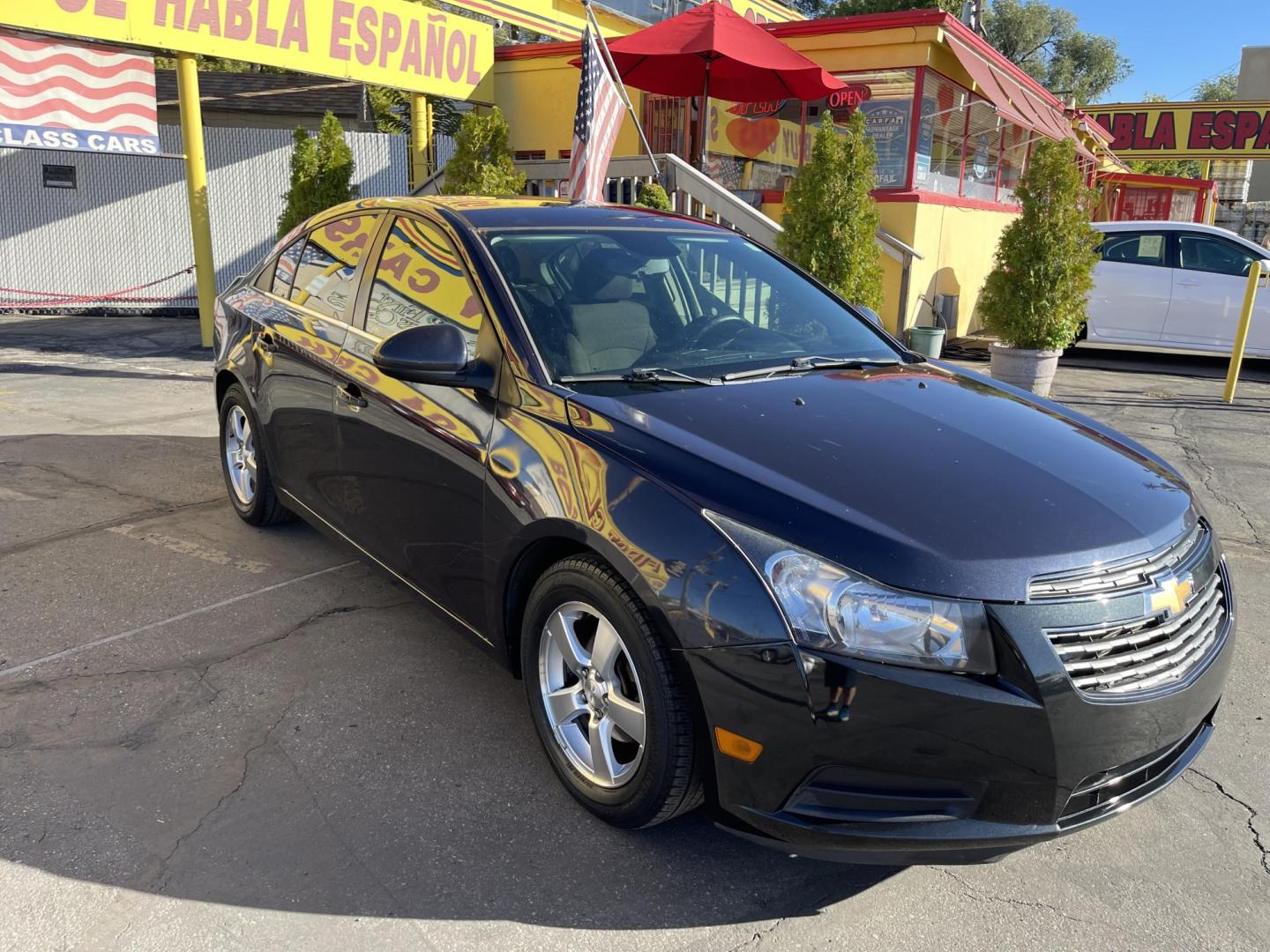 2013 Black Metallic /Black Chevrolet Cruze 1LT Auto (1G1PC5SB5D7) with an 1.4L L4 DOHC 16V TURBO engine, 6-Speed Automatic transmission, located at 801 South State Street, Salt Lake City, UT, 84111, (801) 328-0098, 40.751953, -111.888206 - Clean title! Clean Carfax history report only 2 previous owners!!! Low miles for the year! Vehicle is in good condition inside and out a must see to believe!!! EPA estimated fuel economy stands at 24 mpg city/35 mpg highway and 27 mpg combined great on gas! Features: Alloy Wheels, Satellite Radio R - Photo#3