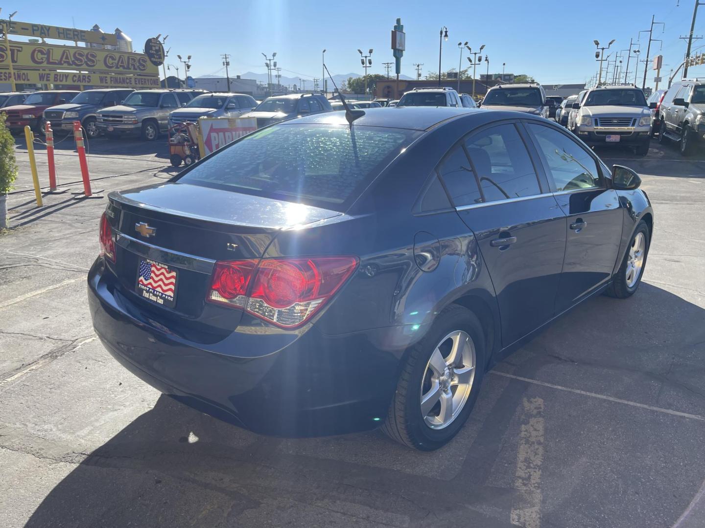 2013 Black Metallic /Black Chevrolet Cruze 1LT Auto (1G1PC5SB5D7) with an 1.4L L4 DOHC 16V TURBO engine, 6-Speed Automatic transmission, located at 801 South State Street, Salt Lake City, UT, 84111, (801) 328-0098, 40.751953, -111.888206 - Clean title! Clean Carfax history report only 2 previous owners!!! Low miles for the year! Vehicle is in good condition inside and out a must see to believe!!! EPA estimated fuel economy stands at 24 mpg city/35 mpg highway and 27 mpg combined great on gas! Features: Alloy Wheels, Satellite Radio R - Photo#5