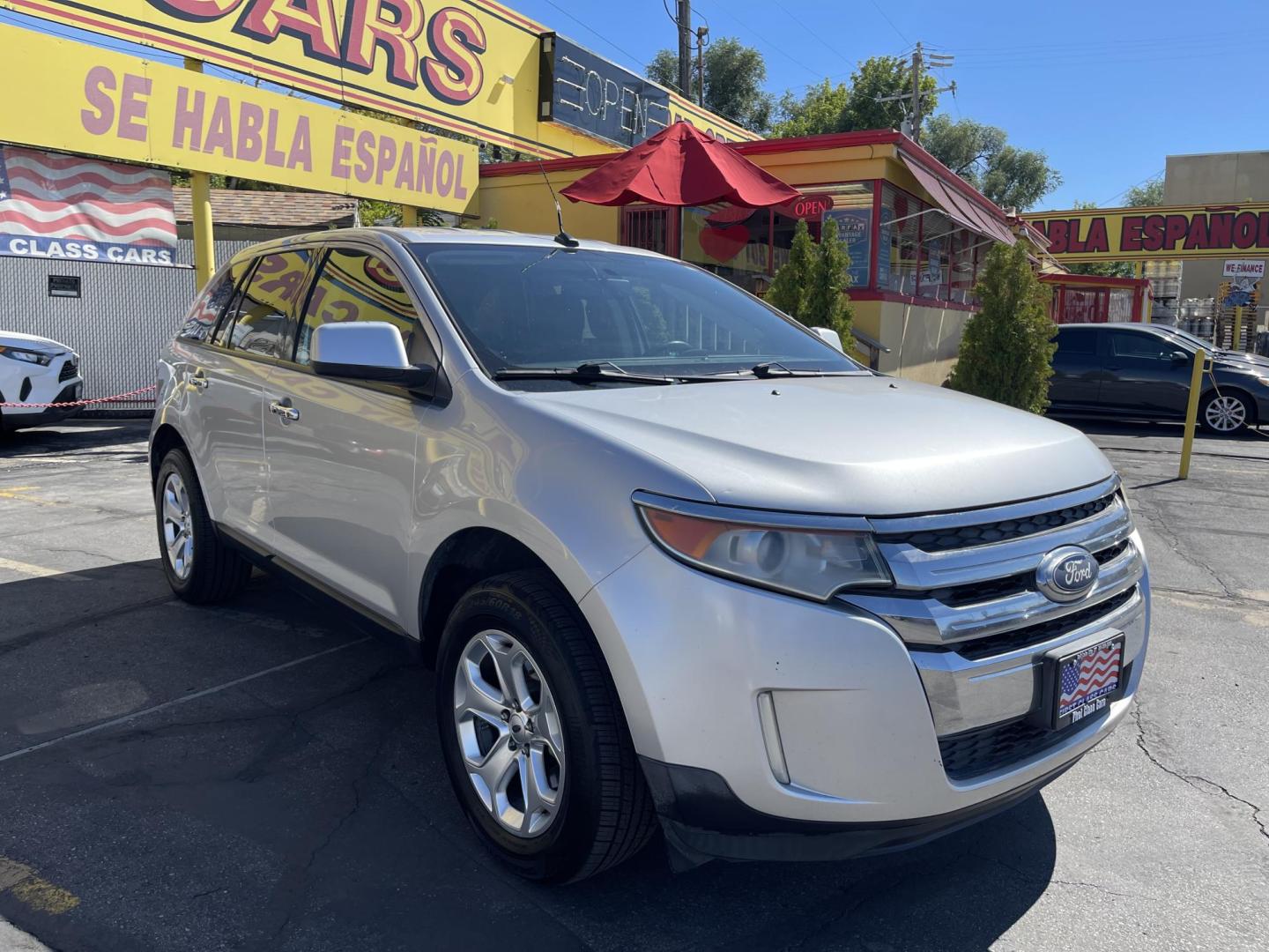 2011 Satin Silver Metallic /Black Ford Edge SEL FWD (2FMDK3JC2BB) with an 3.5L V6 DOHC 24V engine, 6-Speed Automatic transmission, located at 801 South State Street, Salt Lake City, UT, 84111, (801) 328-0098, 40.751953, -111.888206 - Clean Carfax no reported accidents on Carfax! Nice SUV! Features: Alloy Wheels, Parking Sensors, Bluetooth Technology, Satellite Radio Ready, Cloth Seats, SiriusXM Trial Available, ABS Brakes, Auxiliary Audio Input, Power Locks, Rear Defroster, AM/FM Stereo, CD Audio, Power Mirrors, Side Airbags, - Photo#4