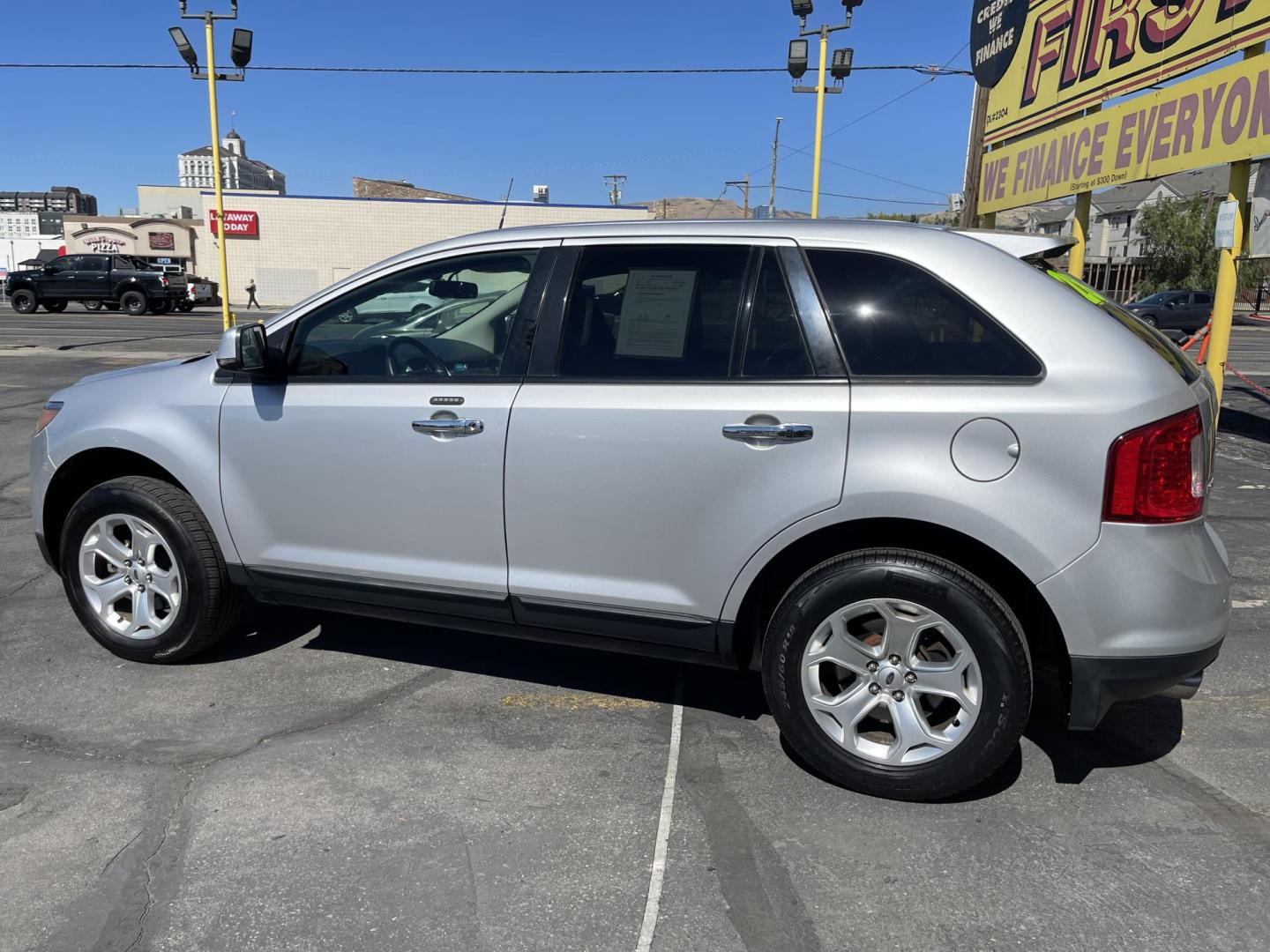 2011 Satin Silver Metallic /Black Ford Edge SEL FWD (2FMDK3JC2BB) with an 3.5L V6 DOHC 24V engine, 6-Speed Automatic transmission, located at 801 South State Street, Salt Lake City, UT, 84111, (801) 328-0098, 40.751953, -111.888206 - Clean Carfax no reported accidents on Carfax! Nice SUV! Features: Alloy Wheels, Parking Sensors, Bluetooth Technology, Satellite Radio Ready, Cloth Seats, SiriusXM Trial Available, ABS Brakes, Auxiliary Audio Input, Power Locks, Rear Defroster, AM/FM Stereo, CD Audio, Power Mirrors, Side Airbags, - Photo#10