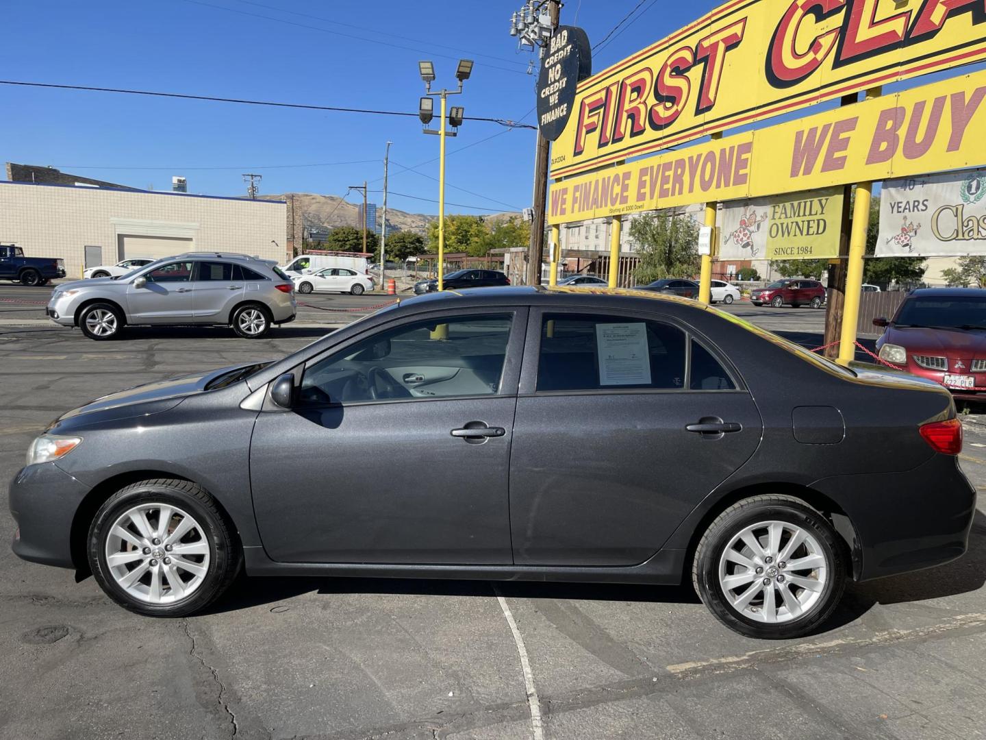 2009 Graphite Pearl /Gray Toyota Corolla LE (JTDBL40E89J) with an 1.8L L4 DOHC 16V engine, 5-Speed Automatic Overdrive transmission, located at 801 South State Street, Salt Lake City, UT, 84111, (801) 328-0098, 40.751953, -111.888206 - Clean title! Clean Carfax history report no reported accidents on Carfax! Only 3 previous owners reported. From a dry climate area! Great gas mileage! Boasts 35 Highway MPG and 27 City MPG! This Toyota COROLLA delivers a Gas I4 1.8L/110 engine powering this Automatic transmission. Features: Cloth - Photo#8