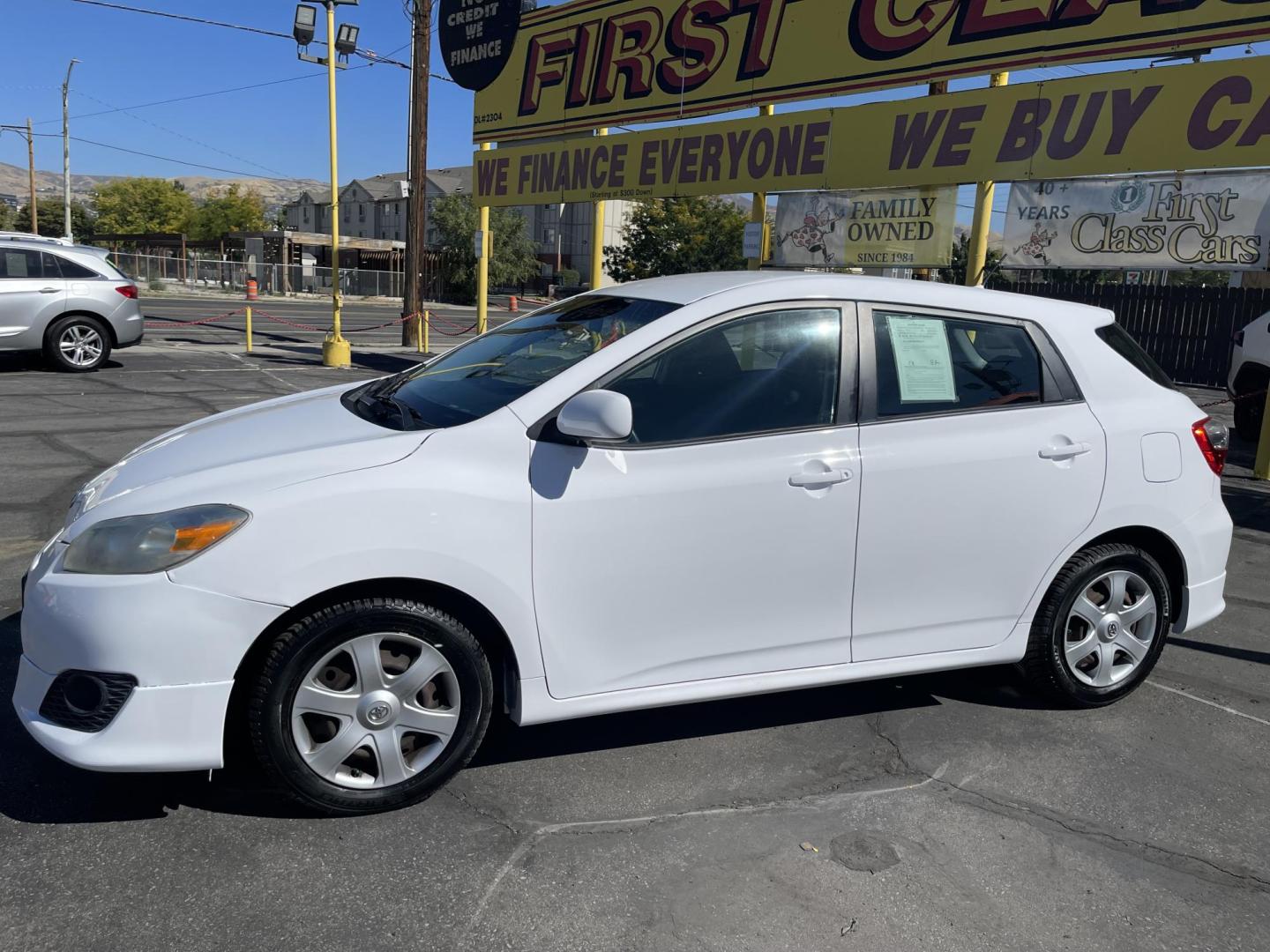 2009 Galaxy White /Black Toyota Matrix S 5-Speed AT (2T1KE40E69C) with an 2.4L L4 engine, Automatic with Overdrive transmission, located at 801 South State Street, Salt Lake City, UT, 84111, (801) 328-0098, 40.751953, -111.888206 - Clean title! No reported accidents on the Carfax vehicle history report! Great gas saver! 26 mpg city and 32 mpg highway!!! Great commuter must see!!! Features: Cloth Seats, ABS Brakes, Auxiliary Audio Input, Power Locks, Side Airbags, AM/FM Stereo, CD Audio, Power Mirrors, Air Conditioning, Cruise - Photo#9