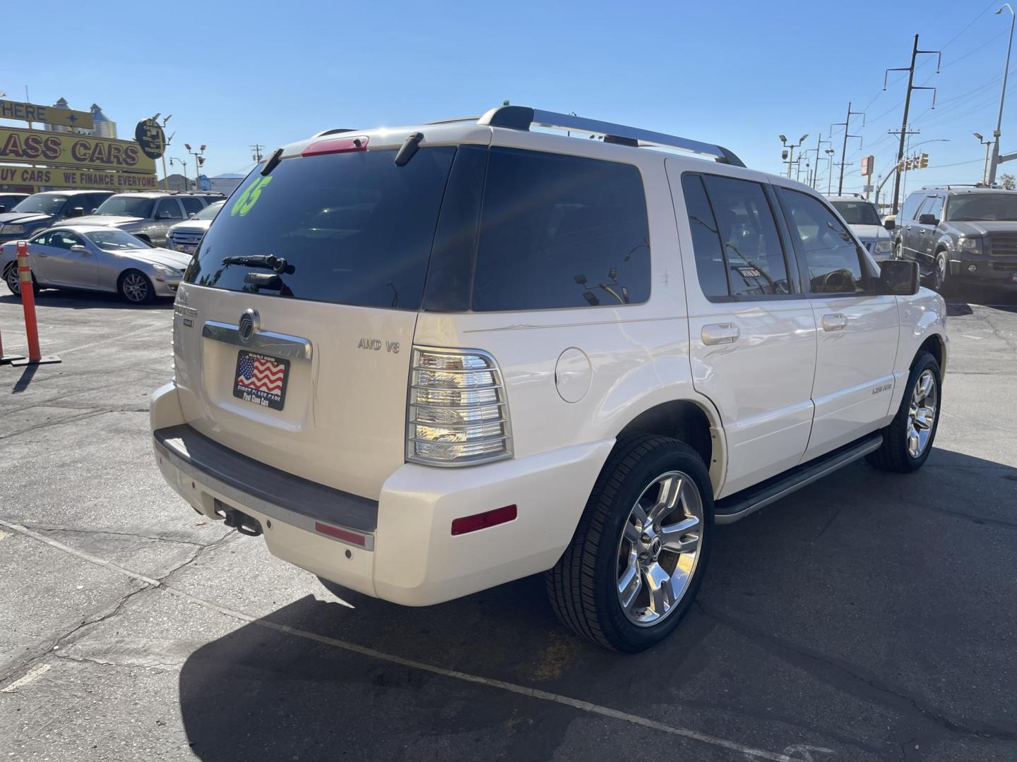 2010 Galaxy White /Tan Mercury Mountaineer Premier 4.6L AWD (4M2EN4J84AU) with an 4.6L V8 SOHC 12V engine, 6-Speed Automatic Overdrive transmission, located at 801 South State Street, Salt Lake City, UT, 84111, (801) 328-0098, 40.751953, -111.888206 - Clean title no reported accidents on Carfax history report!!! Very nice all wheel drive SUV for winter! In great condition for the year, make and miles!!! 3rd Row seating, Navigation and leather seats loaded with lots of extras! Must see very clean SUV. Features: 20 Inch Plus Wheels, Parking Senso - Photo#5