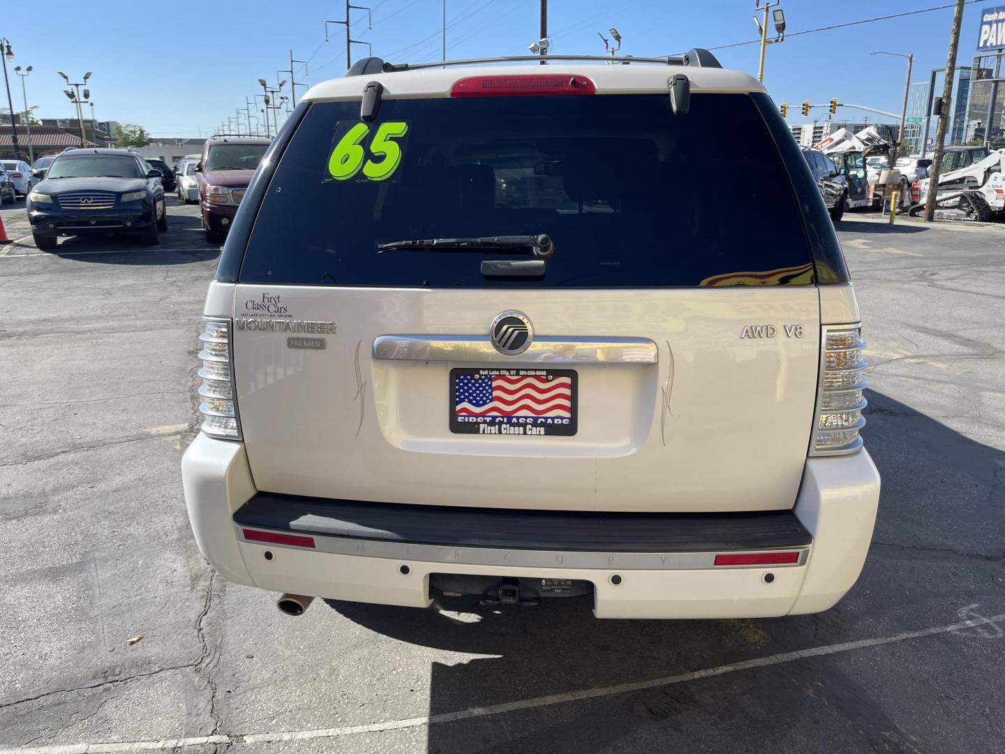 2010 Galaxy White /Tan Mercury Mountaineer Premier 4.6L AWD (4M2EN4J84AU) with an 4.6L V8 SOHC 12V engine, 6-Speed Automatic Overdrive transmission, located at 801 South State Street, Salt Lake City, UT, 84111, (801) 328-0098, 40.751953, -111.888206 - Clean title no reported accidents on Carfax history report!!! Very nice all wheel drive SUV for winter! In great condition for the year, make and miles!!! 3rd Row seating, Navigation and leather seats loaded with lots of extras! Must see very clean SUV. Features: 20 Inch Plus Wheels, Parking Senso - Photo#6