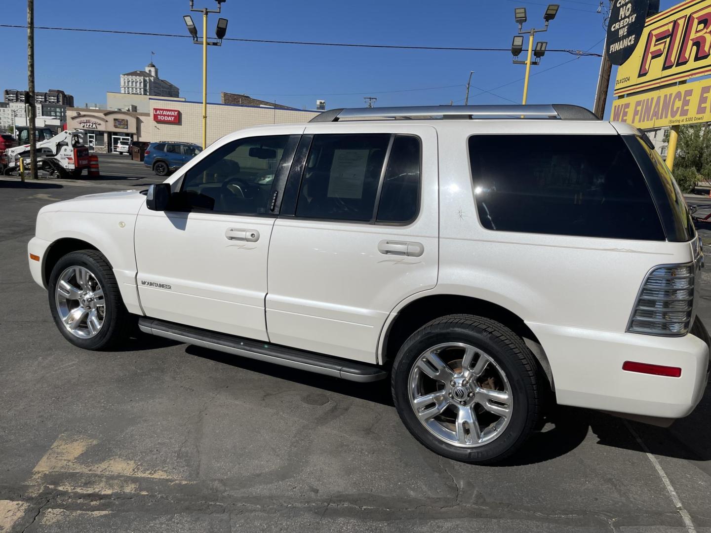 2010 Galaxy White /Tan Mercury Mountaineer Premier 4.6L AWD (4M2EN4J84AU) with an 4.6L V8 SOHC 12V engine, 6-Speed Automatic Overdrive transmission, located at 801 South State Street, Salt Lake City, UT, 84111, (801) 328-0098, 40.751953, -111.888206 - Clean title no reported accidents on Carfax history report!!! Very nice all wheel drive SUV for winter! In great condition for the year, make and miles!!! 3rd Row seating, Navigation and leather seats loaded with lots of extras! Must see very clean SUV. Features: 20 Inch Plus Wheels, Parking Senso - Photo#8