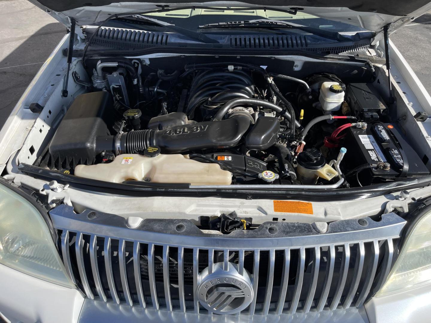 2010 Galaxy White /Tan Mercury Mountaineer Premier 4.6L AWD (4M2EN4J84AU) with an 4.6L V8 SOHC 12V engine, 6-Speed Automatic Overdrive transmission, located at 801 South State Street, Salt Lake City, UT, 84111, (801) 328-0098, 40.751953, -111.888206 - Clean title no reported accidents on Carfax history report!!! Very nice all wheel drive SUV for winter! In great condition for the year, make and miles!!! 3rd Row seating, Navigation and leather seats loaded with lots of extras! Must see very clean SUV. Features: 20 Inch Plus Wheels, Parking Senso - Photo#23