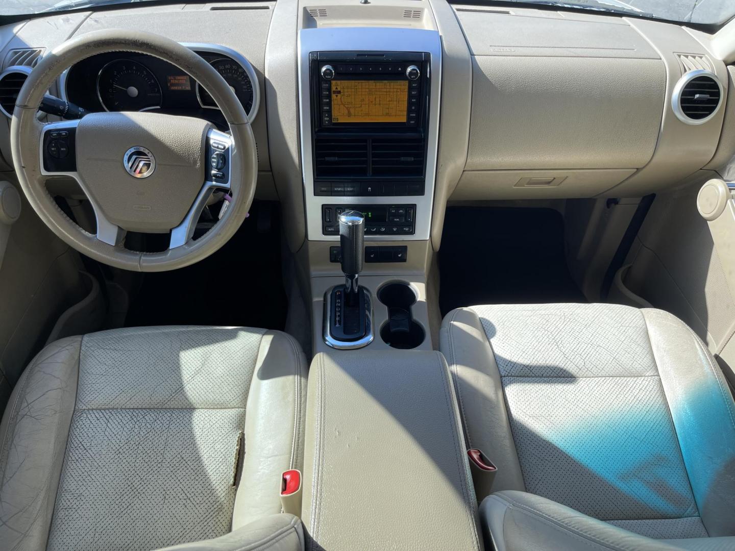 2010 Galaxy White /Tan Mercury Mountaineer Premier 4.6L AWD (4M2EN4J84AU) with an 4.6L V8 SOHC 12V engine, 6-Speed Automatic Overdrive transmission, located at 801 South State Street, Salt Lake City, UT, 84111, (801) 328-0098, 40.751953, -111.888206 - Clean title no reported accidents on Carfax history report!!! Very nice all wheel drive SUV for winter! In great condition for the year, make and miles!!! 3rd Row seating, Navigation and leather seats loaded with lots of extras! Must see very clean SUV. Features: 20 Inch Plus Wheels, Parking Senso - Photo#13