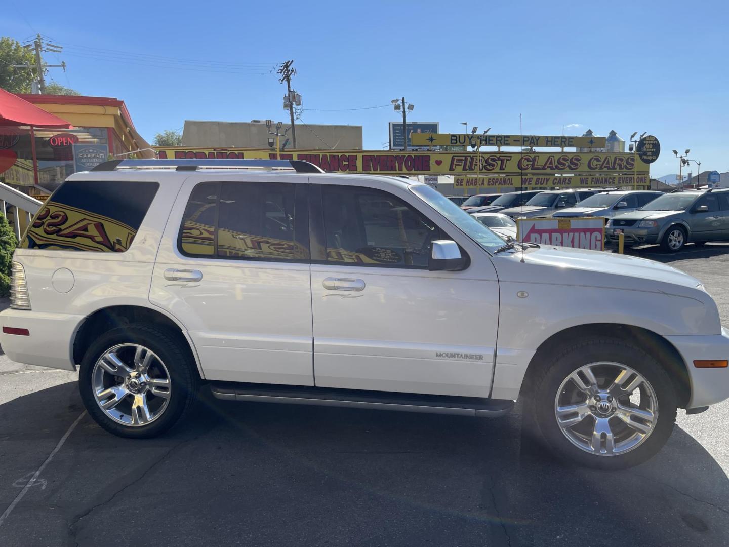 2010 Galaxy White /Tan Mercury Mountaineer Premier 4.6L AWD (4M2EN4J84AU) with an 4.6L V8 SOHC 12V engine, 6-Speed Automatic Overdrive transmission, located at 801 South State Street, Salt Lake City, UT, 84111, (801) 328-0098, 40.751953, -111.888206 - Clean title no reported accidents on Carfax history report!!! Very nice all wheel drive SUV for winter! In great condition for the year, make and miles!!! 3rd Row seating, Navigation and leather seats loaded with lots of extras! Must see very clean SUV. Features: 20 Inch Plus Wheels, Parking Senso - Photo#4