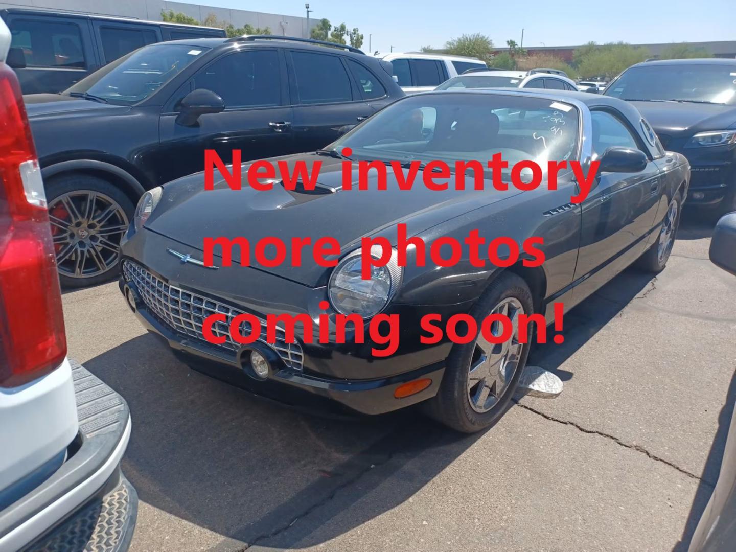 2002 Black Noir Pearl /Black Ford Thunderbird Deluxe (1FAHP60AX2Y) with an 3.9L V8 DOHC 32V engine, 5-Speed Automatic Overdrive transmission, located at 801 South State Street, Salt Lake City, UT, 84111, (801) 328-0098, 40.751953, -111.888206 - Rare hard to find soon to be collectors item!!! Super low miles for the year with only 107K Clean title! Clean Carfax history report with no reported accidents on the Carfax report!!! Carfax says only 2 previous owners! You can tell from the photographs whoever owned this vehicle took excellent care - Photo#1