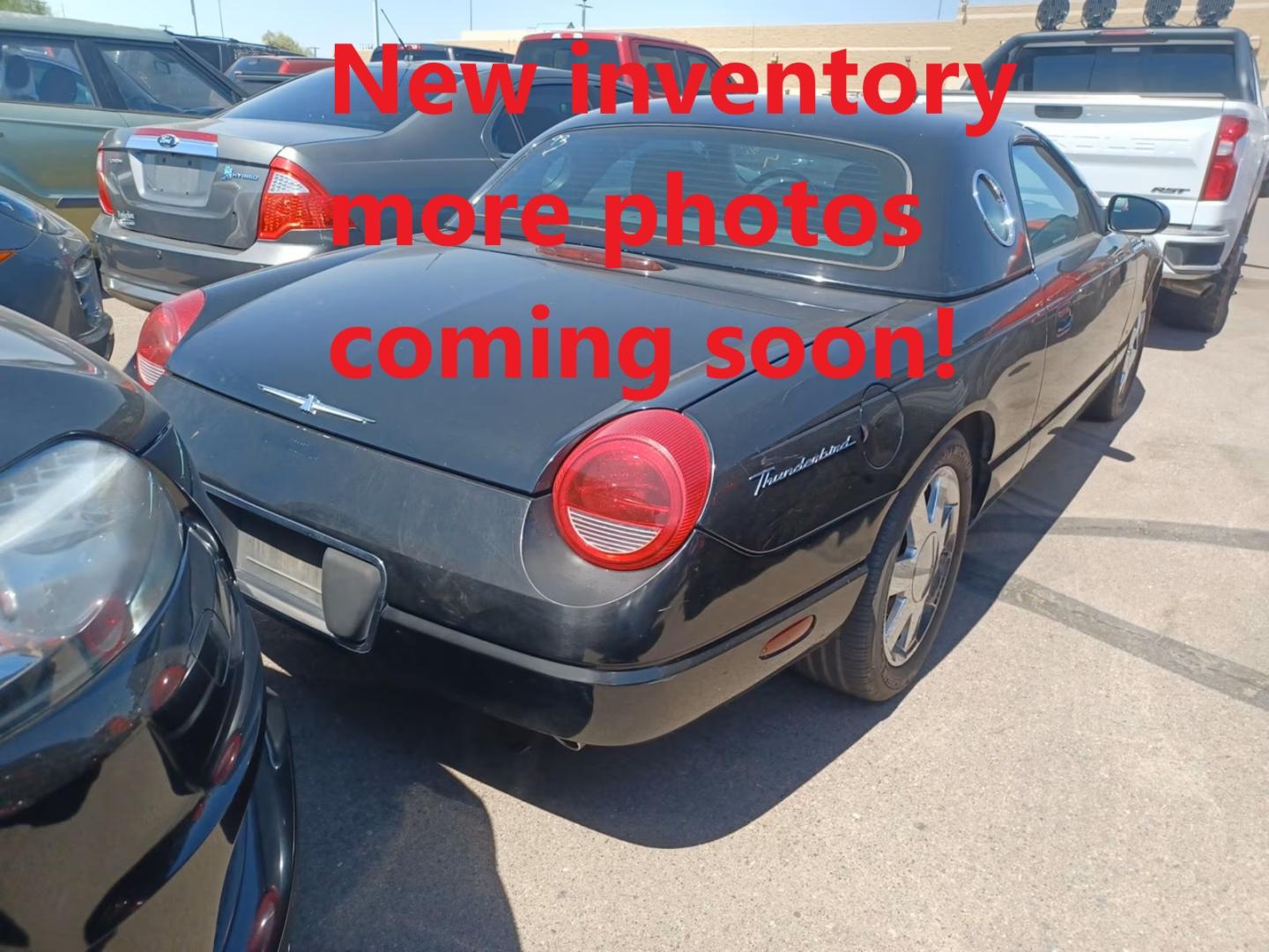 2002 Black Noir Pearl /Black Ford Thunderbird Deluxe (1FAHP60AX2Y) with an 3.9L V8 DOHC 32V engine, 5-Speed Automatic Overdrive transmission, located at 801 South State Street, Salt Lake City, UT, 84111, (801) 328-0098, 40.751953, -111.888206 - Rare hard to find soon to be collectors item!!! Super low miles for the year with only 107K Clean title! Clean Carfax history report with no reported accidents on the Carfax report!!! Carfax says only 2 previous owners! You can tell from the photographs whoever owned this vehicle took excellent care - Photo#2