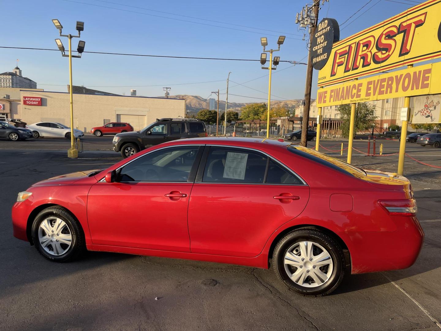 2011 Salsa Red Pearl /Gray Toyota Camry Base 6-Spd AT (4T4BF3EKXBR) with an 2.5L L4 DOHC 16V engine, 6-Speed Automatic transmission, located at 801 South State Street, Salt Lake City, UT, 84111, (801) 328-0098, 40.751953, -111.888206 - 1 owner reported on Carfax Clean title! Very nice 2011 Camry great gas mileage with the 2.5L 4 Cylinder engine. This is in great shape inside and out a real must see for anyone looking for affordable reliable transportation. Vehicle has been meticulously maintained there are 27 service records that - Photo#10