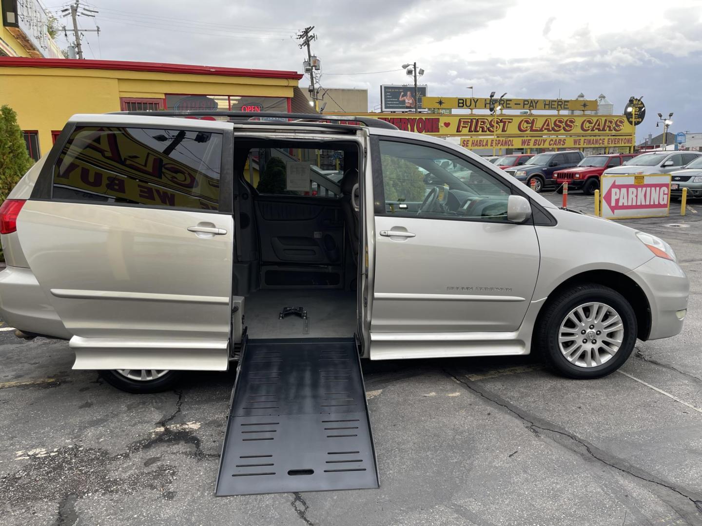 2009 Silver Sky Metallic /Tan Toyota Sienna XLE BraunAbility (5TDZK22C59S) with an 3.5L V6 EFI DOHC 24V engine, 5-Speed Automatic transmission, located at 801 South State Street, Salt Lake City, UT, 84111, (801) 328-0098, 40.751953, -111.888206 - Equipped with BraunAbility motorized wheelchair ramp. Great van in good shape for anyone who needs a handicap accessible van. No middle row seating for the wheelchair ramp. The BraunAbility wheelchair ramp is over $10,000 if you purchase the ramp separately from a BraunAbility dealer not including t - Photo#0