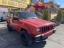 1999 Rallye Red /Black Jeep Cherokee Sport 4-Door 4WD (1J4FF68S3XL) with an 4.0L L6 OHV 12V engine, Automatic transmission, located at 801 South State Street, Salt Lake City, UT, 84111, (801) 328-0098, 40.751953, -111.888206 - Clean 1999 Jeep Cherokee Sport 4x4! Clean title! Only 3 previous owners reported on the Carfax history report. Features: Automatic, 4x4, 4 Door, Tow package, Am/FM/CD, Roof Rack, 4.0L 6 cylinder, cloth seats, power windows, power locks, power steering, rear wiper. - Photo#2