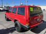 1999 Rallye Red /Black Jeep Cherokee Sport 4-Door 4WD (1J4FF68S3XL) with an 4.0L L6 OHV 12V engine, Automatic transmission, located at 801 South State Street, Salt Lake City, UT, 84111, (801) 328-0098, 40.751953, -111.888206 - Clean 1999 Jeep Cherokee Sport 4x4! Clean title! Only 3 previous owners reported on the Carfax history report. Features: Automatic, 4x4, 4 Door, Tow package, Am/FM/CD, Roof Rack, 4.0L 6 cylinder, cloth seats, power windows, power locks, power steering, rear wiper. - Photo#6