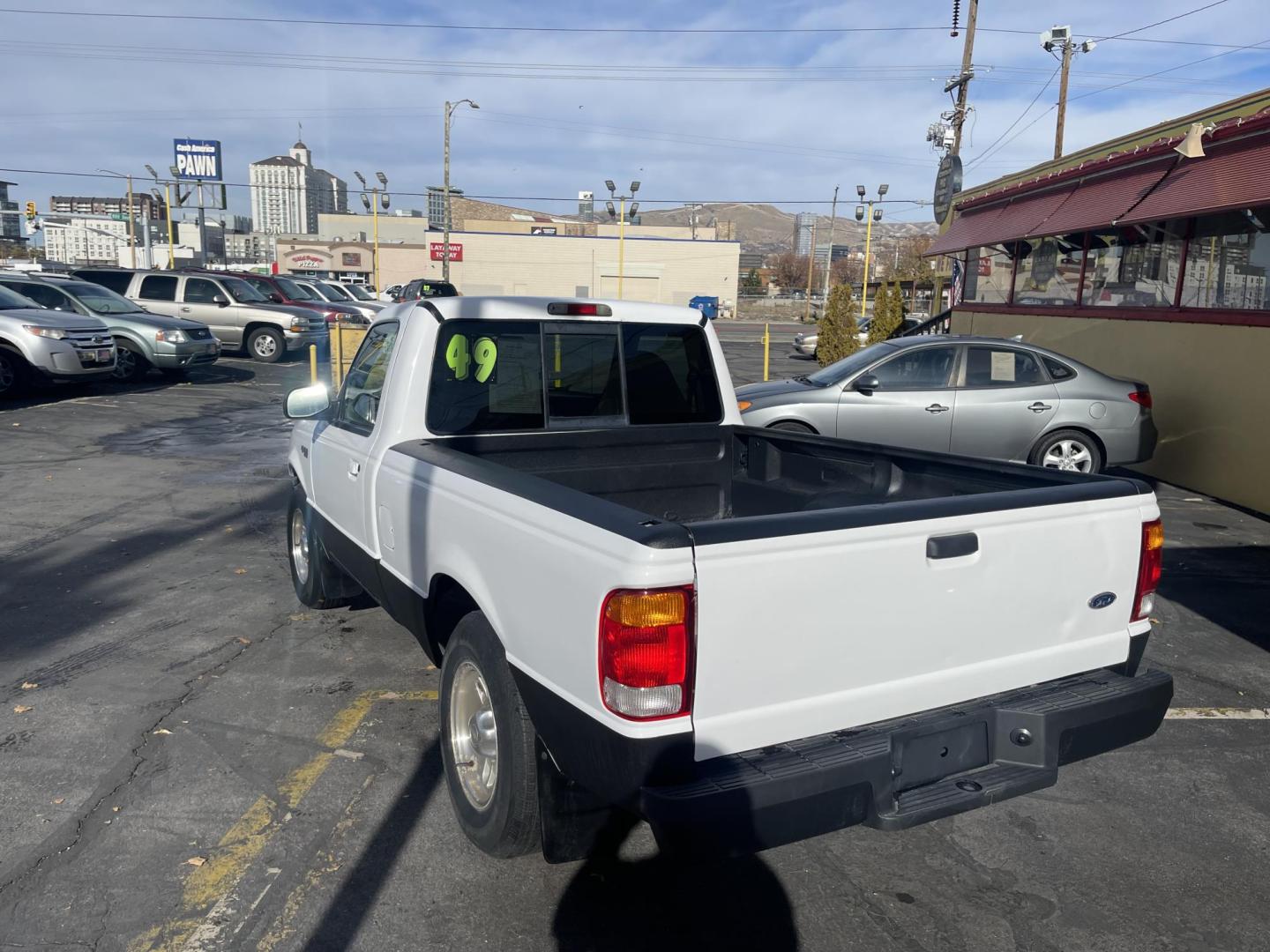 1999 Artic White /Gray Ford Ranger XL Reg. Cab Long Bed (1FTYR10V4XP) with an 3.0L V6 OHV 12V FFV engine, Automatic transmission, located at 801 South State Street, Salt Lake City, UT, 84111, (801) 328-0098, 40.751953, -111.888206 - Hard to find small fuel efficient truck! In great running condition for the year, make and miles! New bed liner has been sprayed in the bed! Clean truck in good running condition! Perfect for anyone looking to run a small business and need a truck for multiple needs. Features: 4 cylinder 3.0 liter - Photo#8