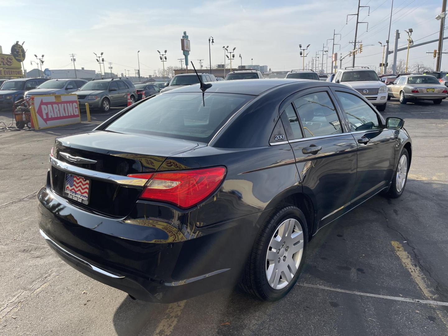 2011 Black Metallic /Black Chrysler 200 Touring (1C3BC1FB0BN) with an 2.4L L4 DOHC 16V engine, 6-Speed Automatic transmission, located at 801 South State Street, Salt Lake City, UT, 84111, (801) 328-0098, 40.751953, -111.888206 - Good on gas! 4 cylinder 2.4 liter! Features: Automatic, Am/Fm/CD, air conditioning, cruise control, power steering, power windows, power locks, power brakes, power seat, 4 door, cloth seats, keyless alarm, window tint! All advertised prices are just dollars above cost to make room for new invent - Photo#5