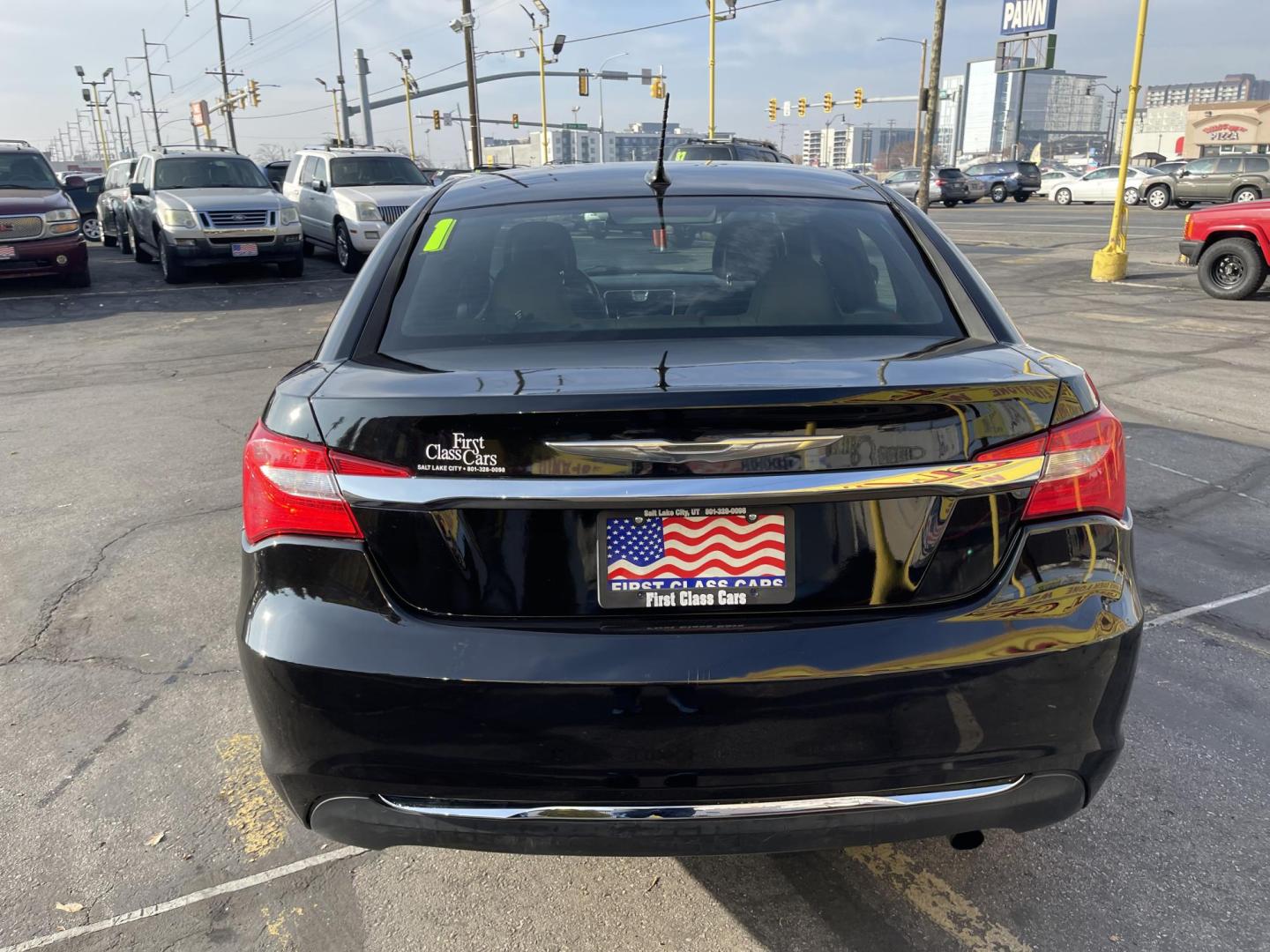 2011 Black Metallic /Black Chrysler 200 Touring (1C3BC1FB0BN) with an 2.4L L4 DOHC 16V engine, 6-Speed Automatic transmission, located at 801 South State Street, Salt Lake City, UT, 84111, (801) 328-0098, 40.751953, -111.888206 - Good on gas! 4 cylinder 2.4 liter! Features: Automatic, Am/Fm/CD, air conditioning, cruise control, power steering, power windows, power locks, power brakes, power seat, 4 door, cloth seats, keyless alarm, window tint! All advertised prices are just dollars above cost to make room for new invent - Photo#6