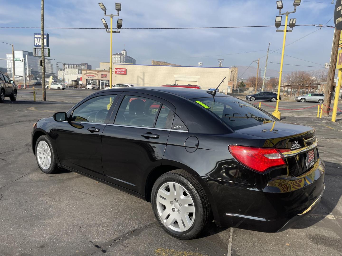 2011 Black Metallic /Black Chrysler 200 Touring (1C3BC1FB0BN) with an 2.4L L4 DOHC 16V engine, 6-Speed Automatic transmission, located at 801 South State Street, Salt Lake City, UT, 84111, (801) 328-0098, 40.751953, -111.888206 - Good on gas! 4 cylinder 2.4 liter! Features: Automatic, Am/Fm/CD, air conditioning, cruise control, power steering, power windows, power locks, power brakes, power seat, 4 door, cloth seats, keyless alarm, window tint! All advertised prices are just dollars above cost to make room for new invent - Photo#8