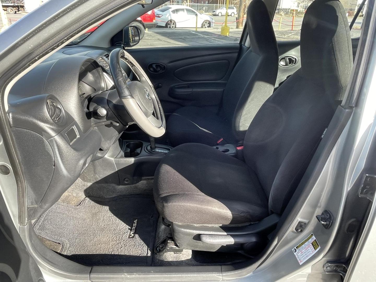 2012 Platinum Gray Metallic /Black Nissan Versa 1.6 S Sedan (3N1CN7AP2CL) with an 1.6L L4 DOHC 16V engine, 5-Speed Manual transmission, located at 801 South State Street, Salt Lake City, UT, 84111, (801) 328-0098, 40.751953, -111.888206 - One owner clean title! No accidents on Carfax history report! From a dry climate area in Arizona has not been in the Utah snow yet! Great gas mileage the fuel economy is 24 mpg in the city and up to 32 mpg on the highway. Features: Cloth Seats, ABS Brakes, Automatic Transmission, Overhead Airbags, - Photo#11