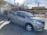 2012 Platinum Gray Metallic /Black Nissan Versa 1.6 S Sedan (3N1CN7AP2CL) with an 1.6L L4 DOHC 16V engine, 5-Speed Manual transmission, located at 801 South State Street, Salt Lake City, UT, 84111, (801) 328-0098, 40.751953, -111.888206 - One owner clean title! No accidents on Carfax history report! From a dry climate area in Arizona has not been in the Utah snow yet! Great gas mileage the fuel economy is 24 mpg in the city and up to 32 mpg on the highway. Features: Cloth Seats, ABS Brakes, Automatic Transmission, Overhead Airbags, - Photo#4