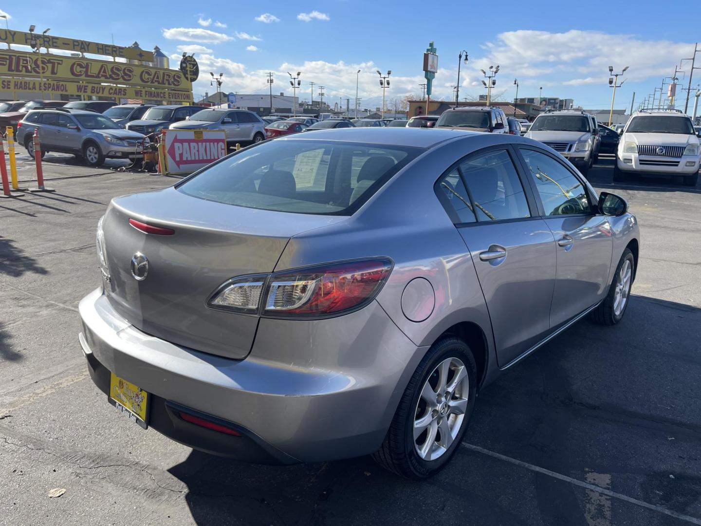 2011 Silver Sky Metallic /Black Mazda MAZDA3 i Touring 4-Door (JM1BL1VG1B1) with an 2.0L L4 DOHC 16V engine, Automatic transmission, located at 801 South State Street, Salt Lake City, UT, 84111, (801) 328-0098, 40.751953, -111.888206 - Car has New Tires! Carfax 1 owner car! Clean title no accidents in great condition for the year and miles! Hard to find, great on gas 25 city highway mpg 32 average gas mileage combined around 27 MPG! Must see for anyone looking for a clean reliable Mazda 3!!!! Features: Alloy Wheels, Bluetooth T - Photo#4