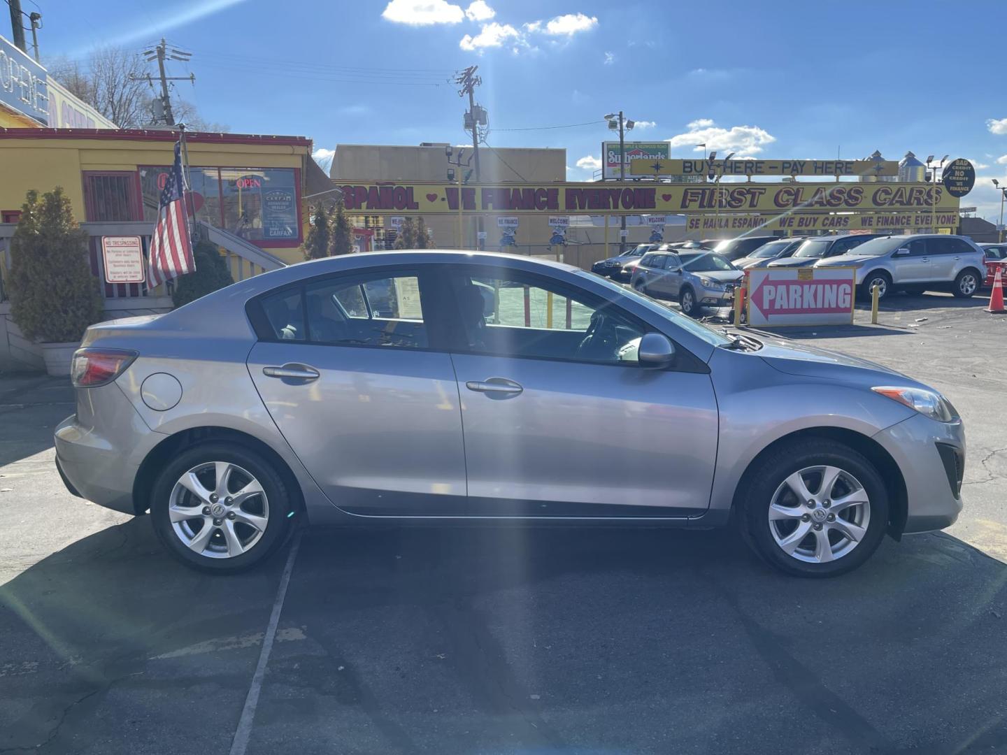 2011 Silver Sky Metallic /Black Mazda MAZDA3 i Touring 4-Door (JM1BL1VG1B1) with an 2.0L L4 DOHC 16V engine, Automatic transmission, located at 801 South State Street, Salt Lake City, UT, 84111, (801) 328-0098, 40.751953, -111.888206 - Car has New Tires! Carfax 1 owner car! Clean title no accidents in great condition for the year and miles! Hard to find, great on gas 25 city highway mpg 32 average gas mileage combined around 27 MPG! Must see for anyone looking for a clean reliable Mazda 3!!!! Features: Alloy Wheels, Bluetooth T - Photo#3