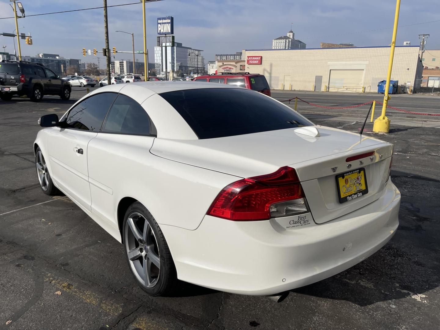 2011 Artic White /Tan Volvo C70 T5 (YV1672MC8BJ) with an 2.5L L5 DOHC 20V TURBO engine, 6-Speed Manual Overdrive transmission, located at 801 South State Street, Salt Lake City, UT, 84111, (801) 328-0098, 40.751953, -111.888206 - Clean title! Real nice car in great condition for the year, make and miles! Must see car for anyone looking for a nice clean car! Features: Alloy Wheels, Memory Seat(s), Bluetooth Technology, Parking Sensors, Front Seat Heaters, Quad Seats, Hard Top, Turbo Charged Engine, Leather Seats ABS Brakes, - Photo#9