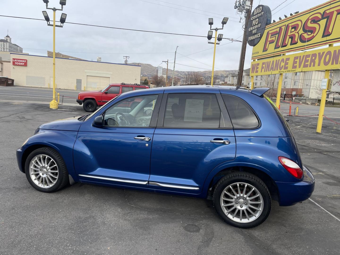 2009 Blue /Tan Chrysler PT Cruiser Limited (3A8FY68849T) with an 2.4L L4 DOHC 16V TURBO engine, Automatic transmission, located at 801 South State Street, Salt Lake City, UT, 84111, (801) 328-0098, 40.751953, -111.888206 - Super clean car with only 83,984 miles! Hard to find in this great shape with low miles! Clean title on Carfax Features: Alloy Wheels, Satellite Radio Ready, Front Seat Heaters, Sunroof(s), Leather Seats, Turbo Charged Engine, ABS Brakes, Auxiliary Audio Input, Power Mirrors, Rear Spoiler, AM/FM S - Photo#9