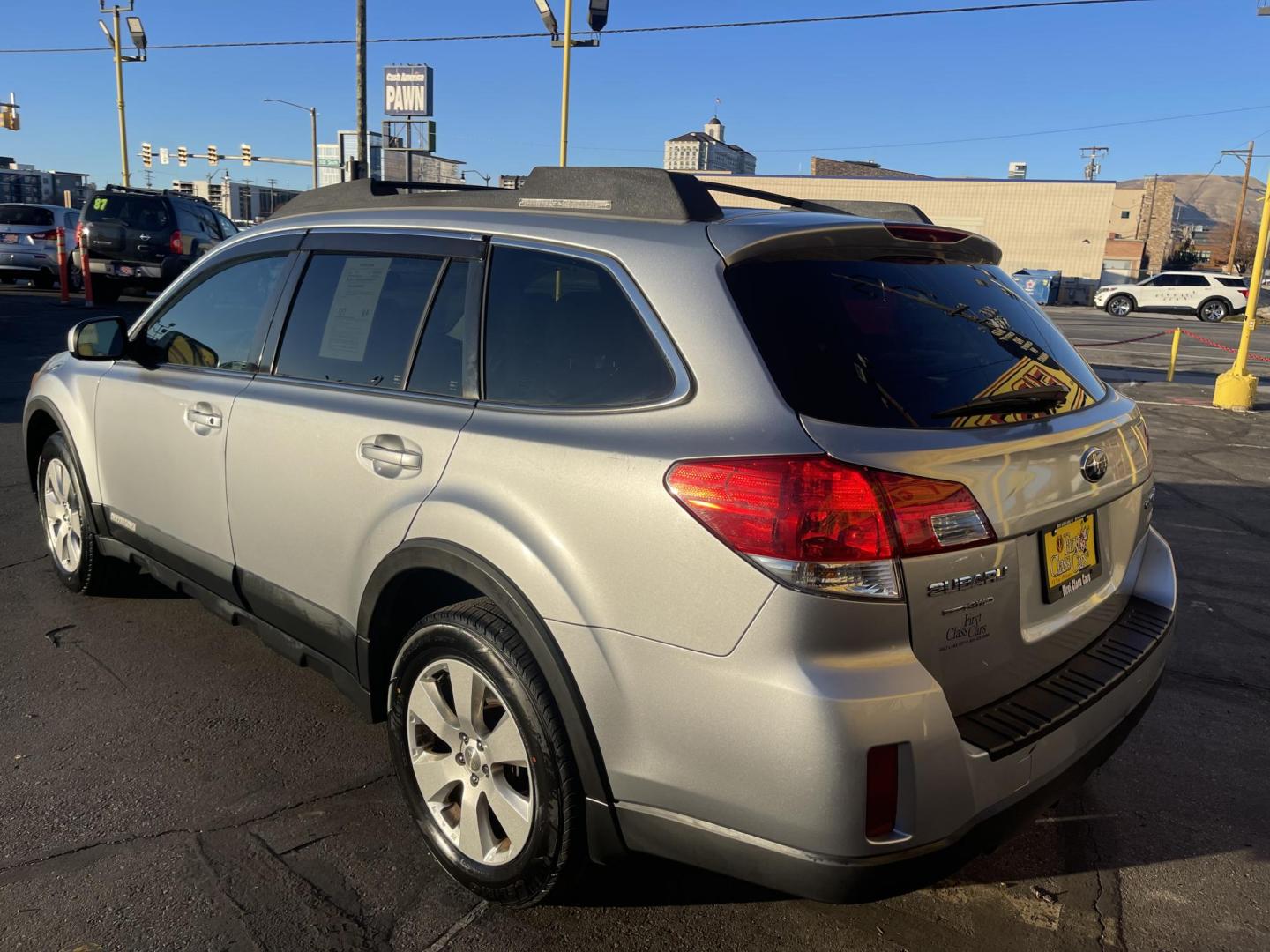 2012 Quick Silver Pearl /Black Subaru Outback 2.5i Premium (4S4BRBGCXC3) with an 2.5L H4 DOHC 16V engine, Automatic transmission, located at 801 South State Street, Salt Lake City, UT, 84111, (801) 328-0098, 40.751953, -111.888206 - New tires! Clean title! Clean Carfax only 2 owners no accidents! Perfect AWD vehicle for winter time! Great gas mileage! Must see for anyone looking for a nice affordable reliable car with AWD! Features: 4WD/AWD, Cloth Seats, Alloy Wheels, Front Seat Heaters, Bluetooth Technology, Tow Hitch, ABS B - Photo#7