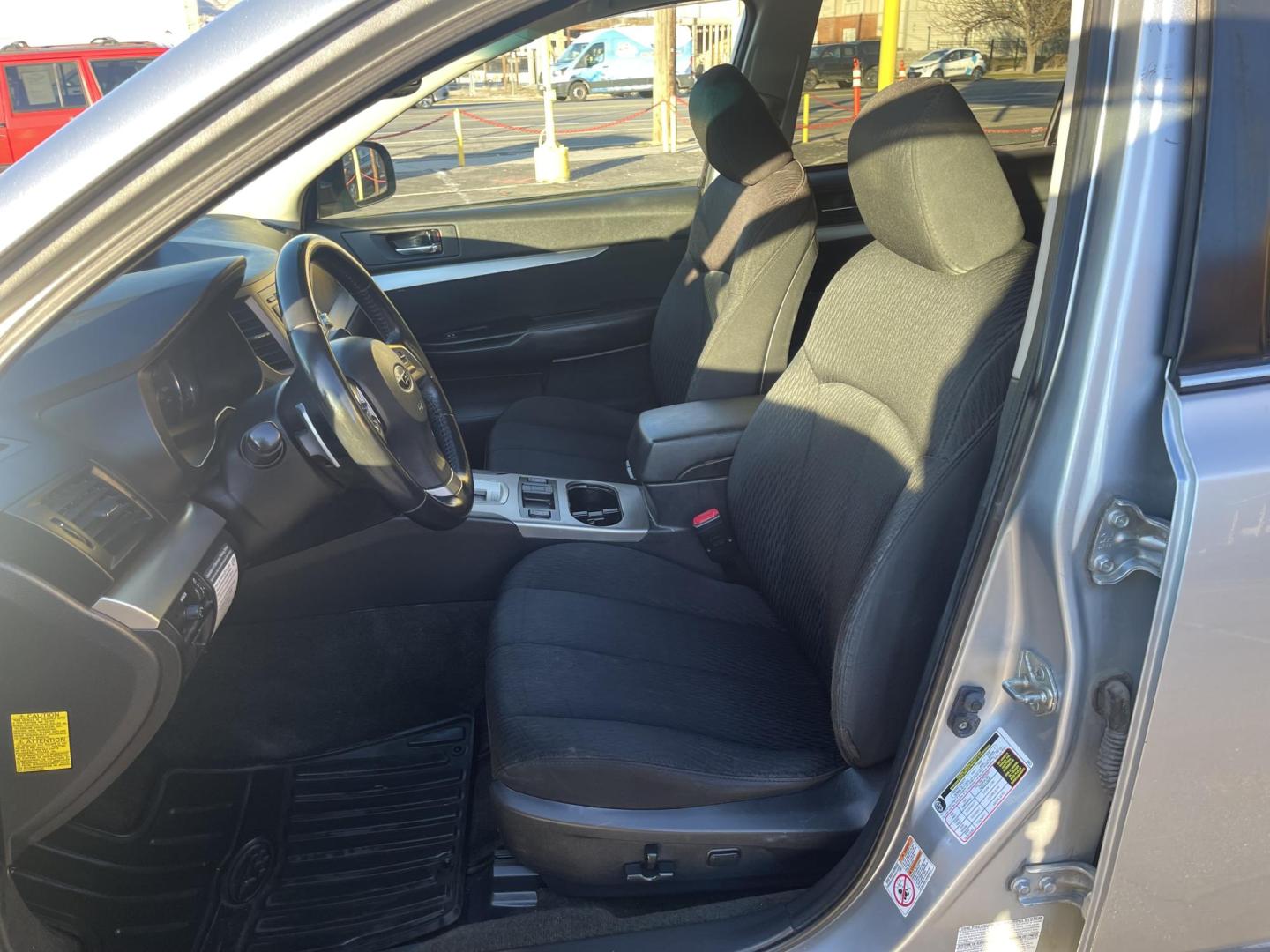 2012 Quick Silver Pearl /Black Subaru Outback 2.5i Premium (4S4BRBGCXC3) with an 2.5L H4 DOHC 16V engine, Automatic transmission, located at 801 South State Street, Salt Lake City, UT, 84111, (801) 328-0098, 40.751953, -111.888206 - New tires! Clean title! Clean Carfax only 2 owners no accidents! Perfect AWD vehicle for winter time! Great gas mileage! Must see for anyone looking for a nice affordable reliable car with AWD! Features: 4WD/AWD, Cloth Seats, Alloy Wheels, Front Seat Heaters, Bluetooth Technology, Tow Hitch, ABS B - Photo#12