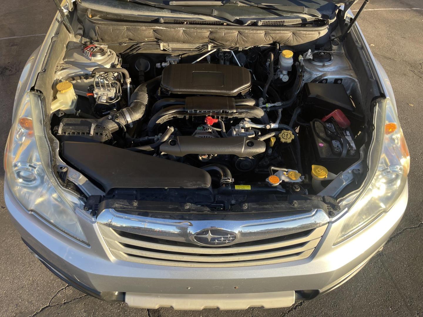 2012 Quick Silver Pearl /Black Subaru Outback 2.5i Premium (4S4BRBGCXC3) with an 2.5L H4 DOHC 16V engine, Automatic transmission, located at 801 South State Street, Salt Lake City, UT, 84111, (801) 328-0098, 40.751953, -111.888206 - New tires! Clean title! Clean Carfax only 2 owners no accidents! Perfect AWD vehicle for winter time! Great gas mileage! Must see for anyone looking for a nice affordable reliable car with AWD! Features: 4WD/AWD, Cloth Seats, Alloy Wheels, Front Seat Heaters, Bluetooth Technology, Tow Hitch, ABS B - Photo#24