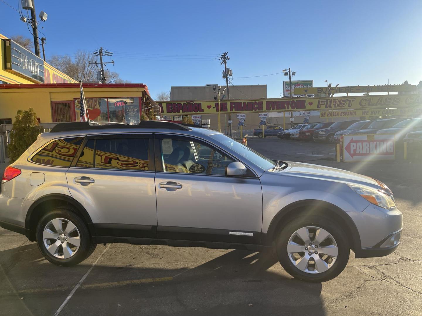 2012 Quick Silver Pearl /Black Subaru Outback 2.5i Premium (4S4BRBGCXC3) with an 2.5L H4 DOHC 16V engine, Automatic transmission, located at 801 South State Street, Salt Lake City, UT, 84111, (801) 328-0098, 40.751953, -111.888206 - New tires! Clean title! Clean Carfax only 2 owners no accidents! Perfect AWD vehicle for winter time! Great gas mileage! Must see for anyone looking for a nice affordable reliable car with AWD! Features: 4WD/AWD, Cloth Seats, Alloy Wheels, Front Seat Heaters, Bluetooth Technology, Tow Hitch, ABS B - Photo#4