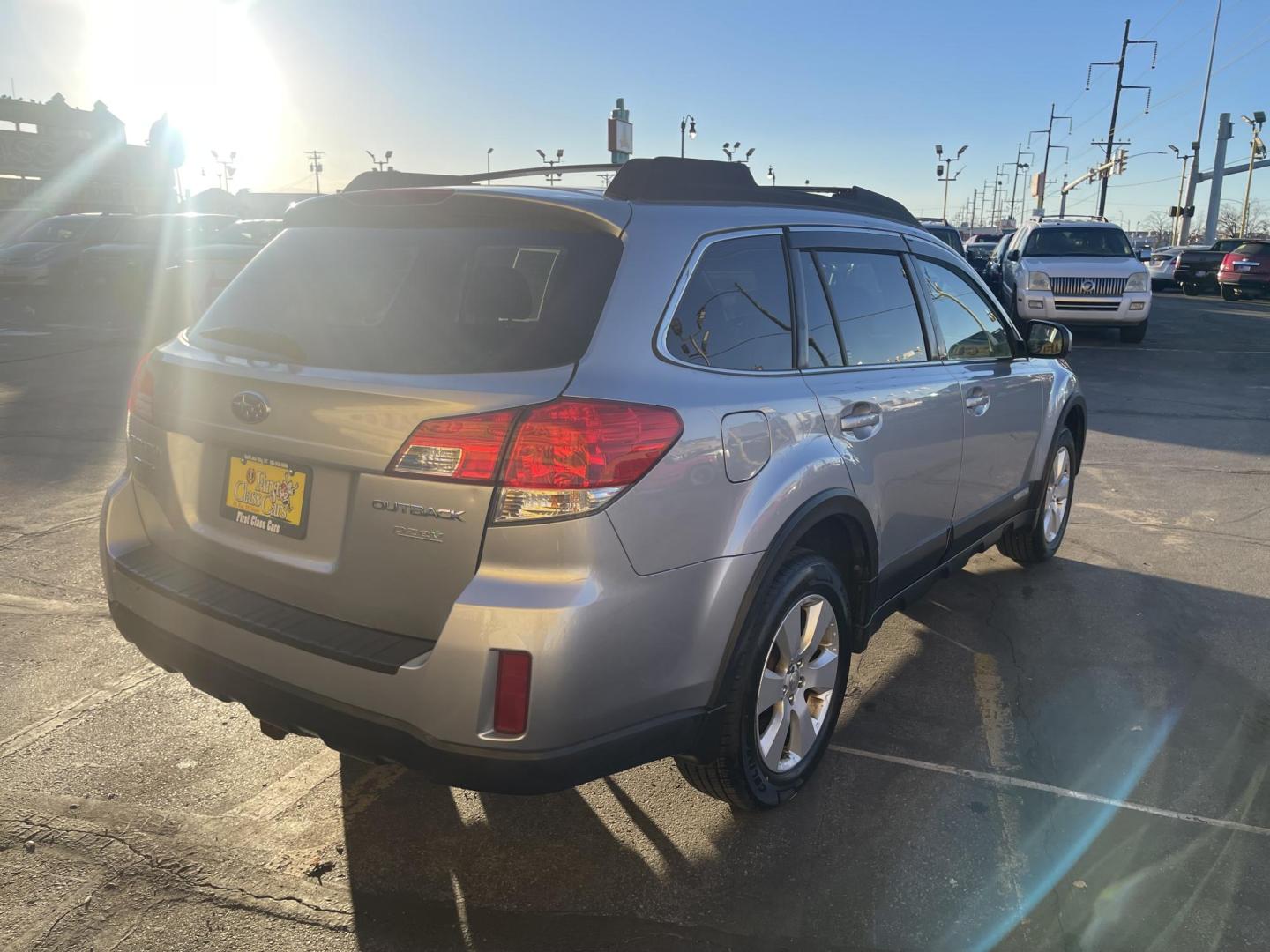 2012 Quick Silver Pearl /Black Subaru Outback 2.5i Premium (4S4BRBGCXC3) with an 2.5L H4 DOHC 16V engine, Automatic transmission, located at 801 South State Street, Salt Lake City, UT, 84111, (801) 328-0098, 40.751953, -111.888206 - New tires! Clean title! Clean Carfax only 2 owners no accidents! Perfect AWD vehicle for winter time! Great gas mileage! Must see for anyone looking for a nice affordable reliable car with AWD! Features: 4WD/AWD, Cloth Seats, Alloy Wheels, Front Seat Heaters, Bluetooth Technology, Tow Hitch, ABS B - Photo#5