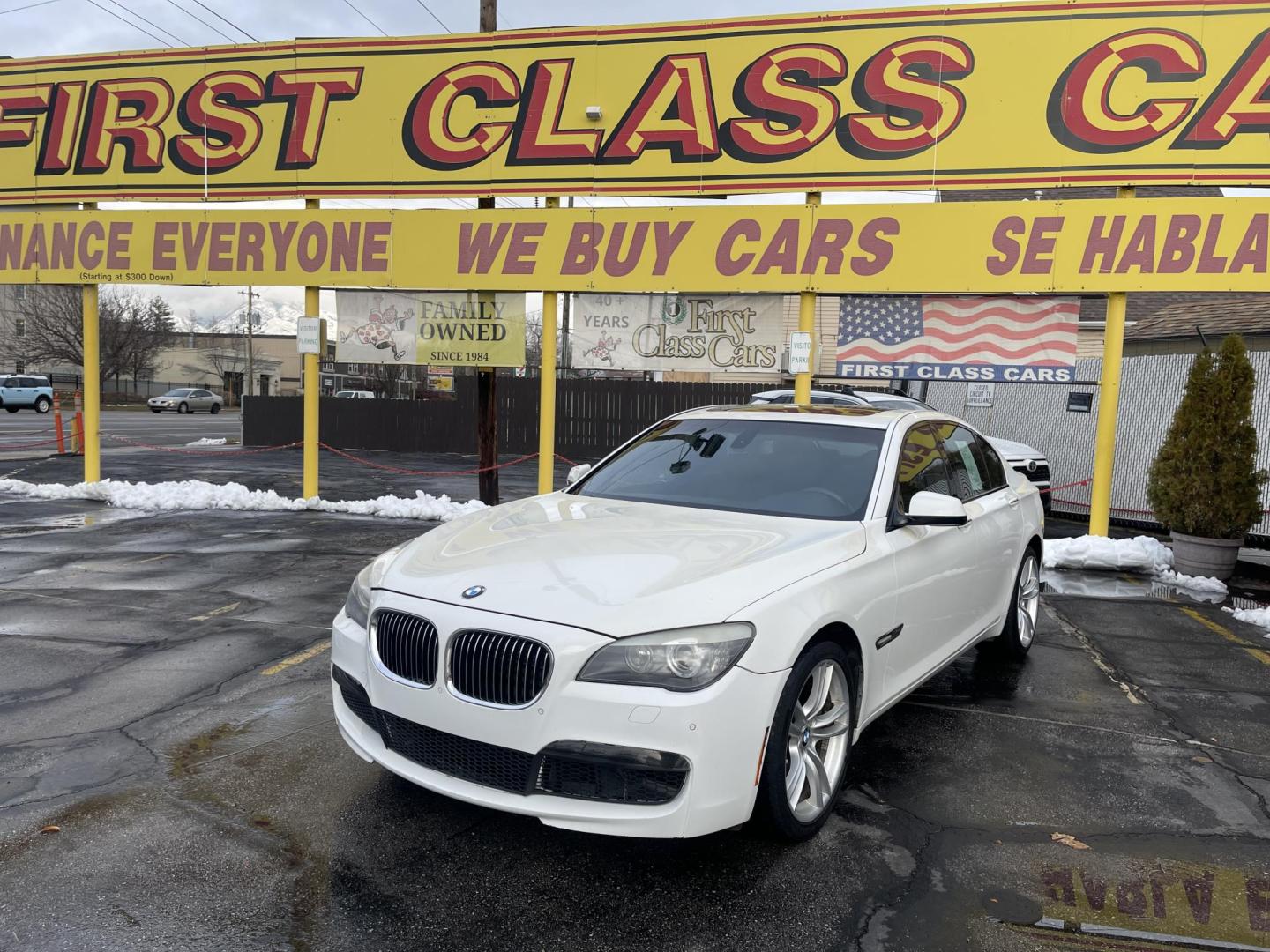 2012 Artic White /Black BMW 7-Series 750i (WBAKA8C57CC) with an 4.8L V8 DOHC 32V engine, 6-Speed Automatic transmission, located at 801 South State Street, Salt Lake City, UT, 84111, (801) 328-0098, 40.751953, -111.888206 - Wow low miles! Clean inside and out immaculate condition!!! Clean title! Runs great! Nice black leather interior in excellent shape for the year make and miles!!! Features: 20 Inch Plus Wheels, Navigation System, A/C Seat(s), Parking Sensors, Alloy Wheels, Power Hatch/Deck Lid, Automated Cruise Con - Photo#1