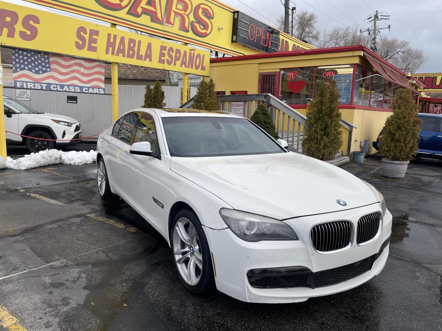 2012 Artic White /Black BMW 7-Series 750i (WBAKA8C57CC) with an 4.8L V8 DOHC 32V engine, 6-Speed Automatic transmission, located at 801 South State Street, Salt Lake City, UT, 84111, (801) 328-0098, 40.751953, -111.888206 - Wow low miles! Clean inside and out immaculate condition!!! Clean title! Runs great! Nice black leather interior in excellent shape for the year make and miles!!! Features: 20 Inch Plus Wheels, Navigation System, A/C Seat(s), Parking Sensors, Alloy Wheels, Power Hatch/Deck Lid, Automated Cruise Con - Photo#4